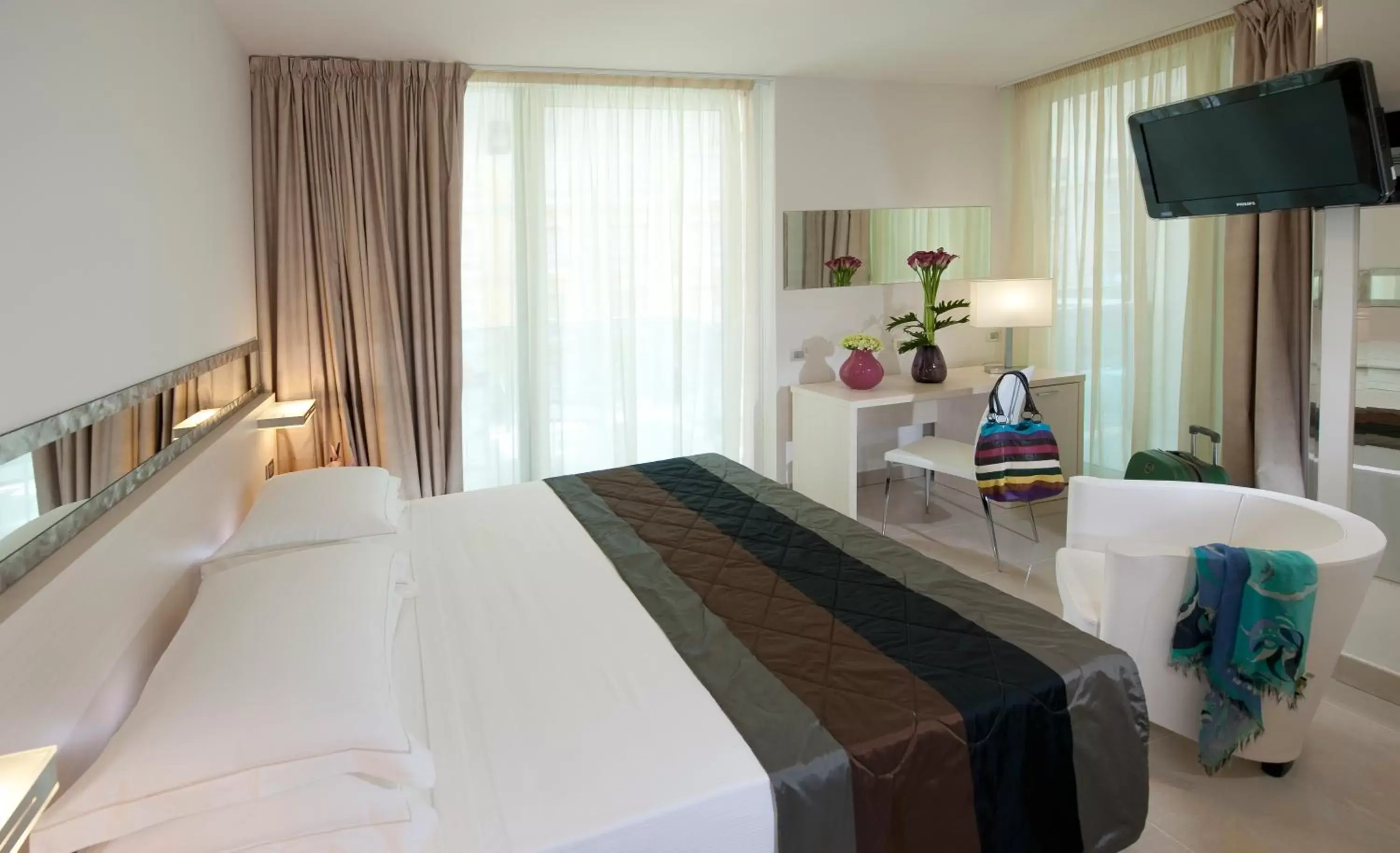 Photo of the whole room, Bed in Mercure Hotel Rimini Artis