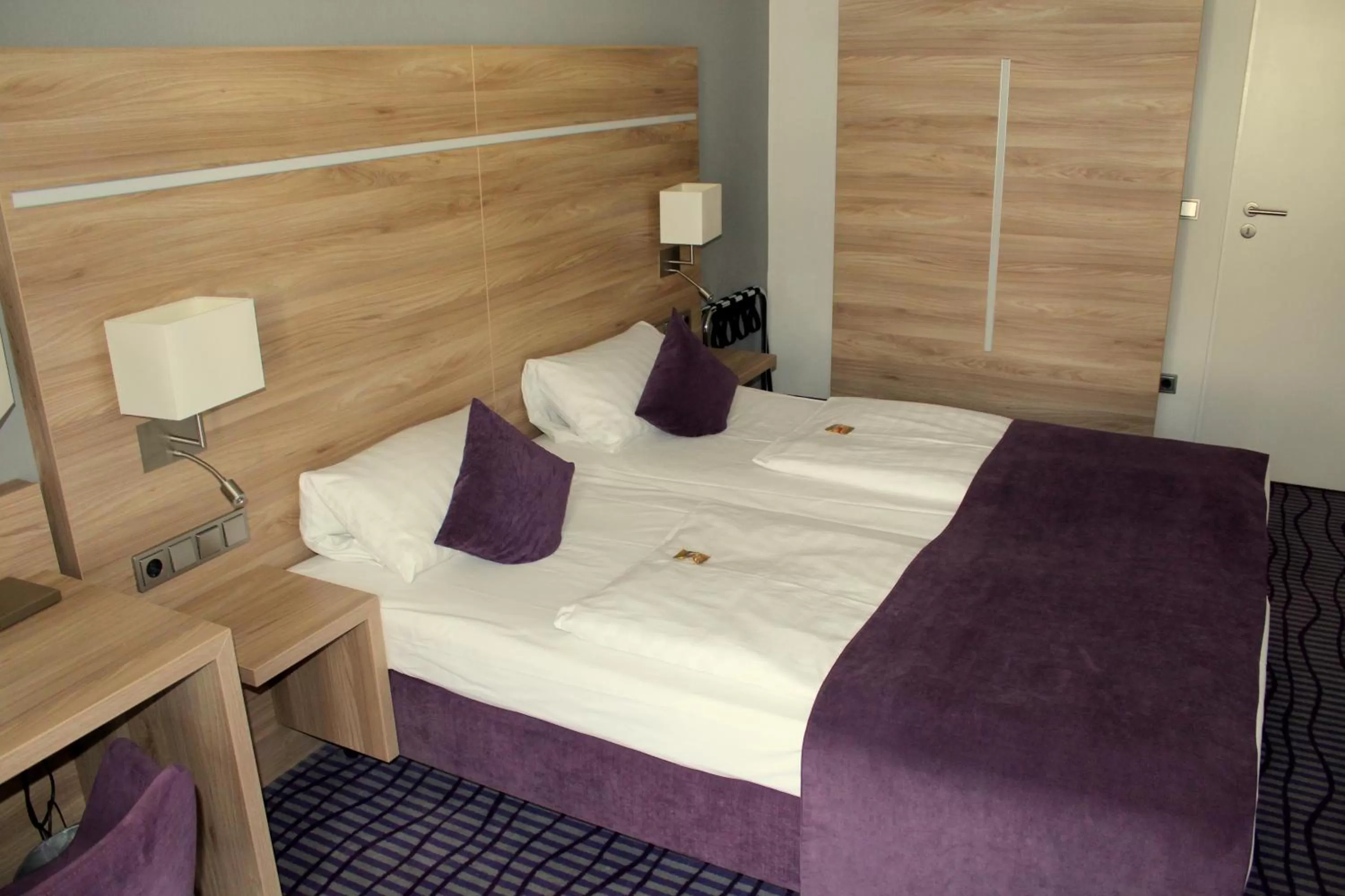 Bed in NP Hotel Wallis