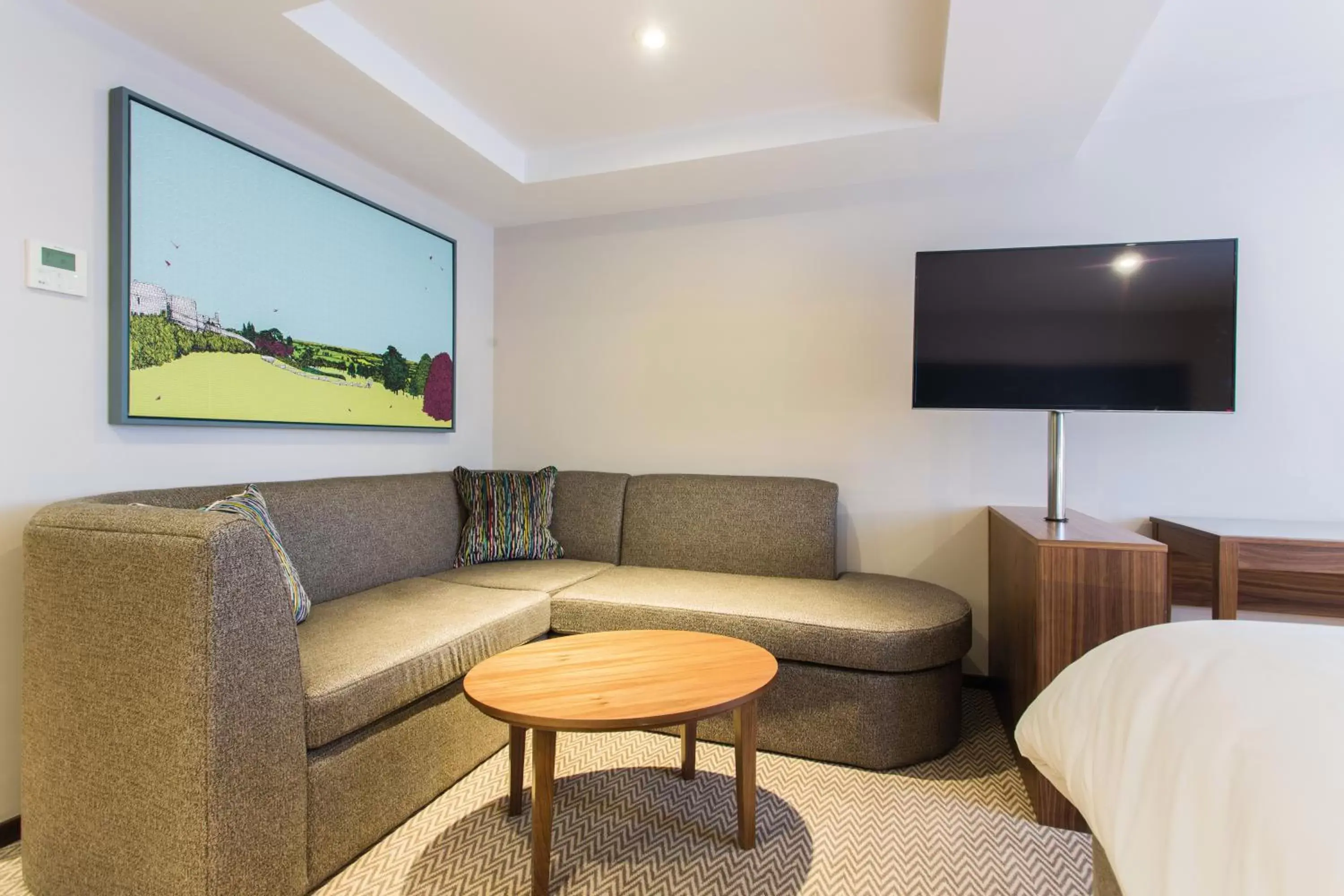 Seating area, TV/Entertainment Center in Cottons Hotel and Spa