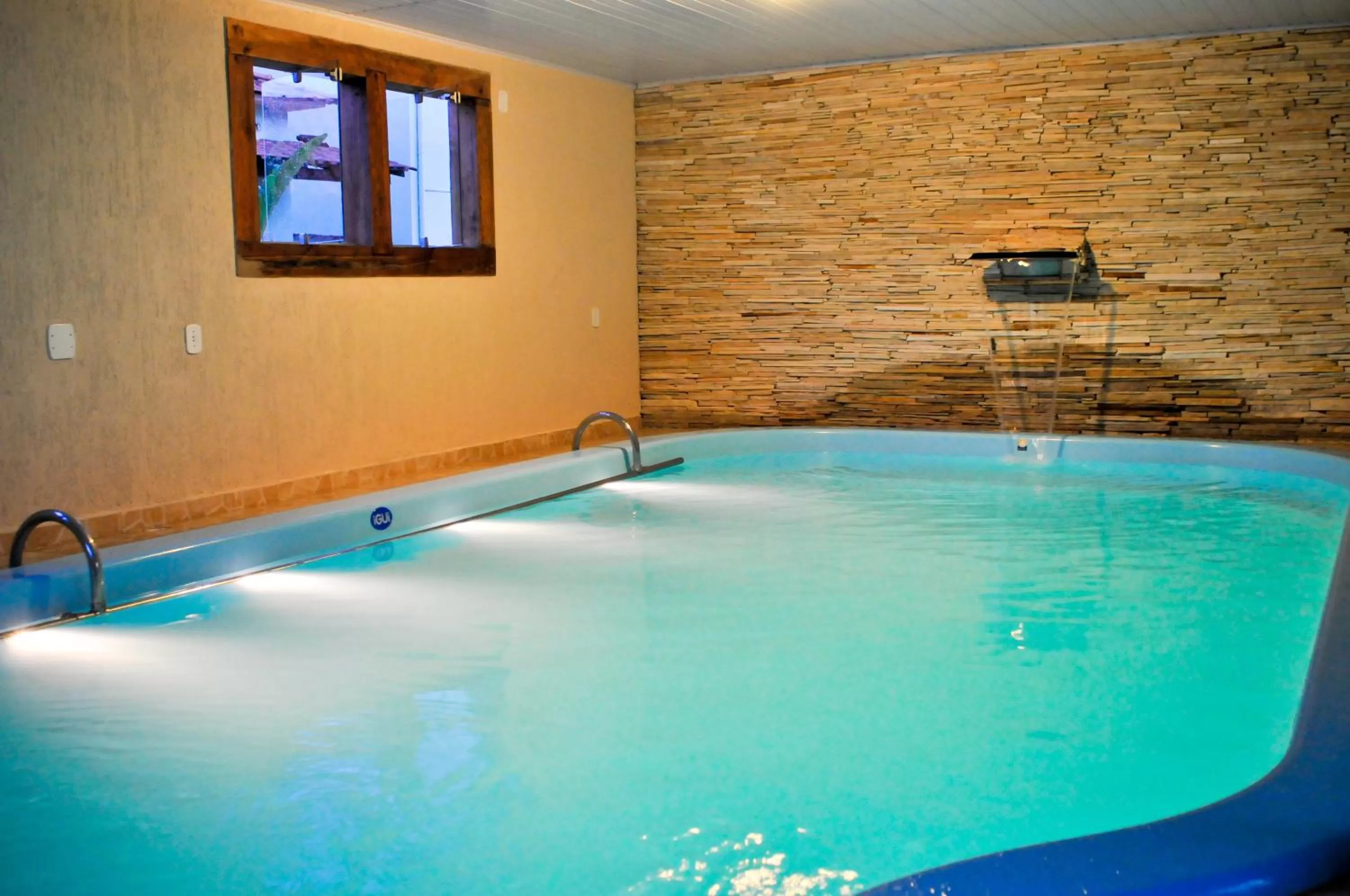 Swimming pool in Pousada Neuza Barbosa