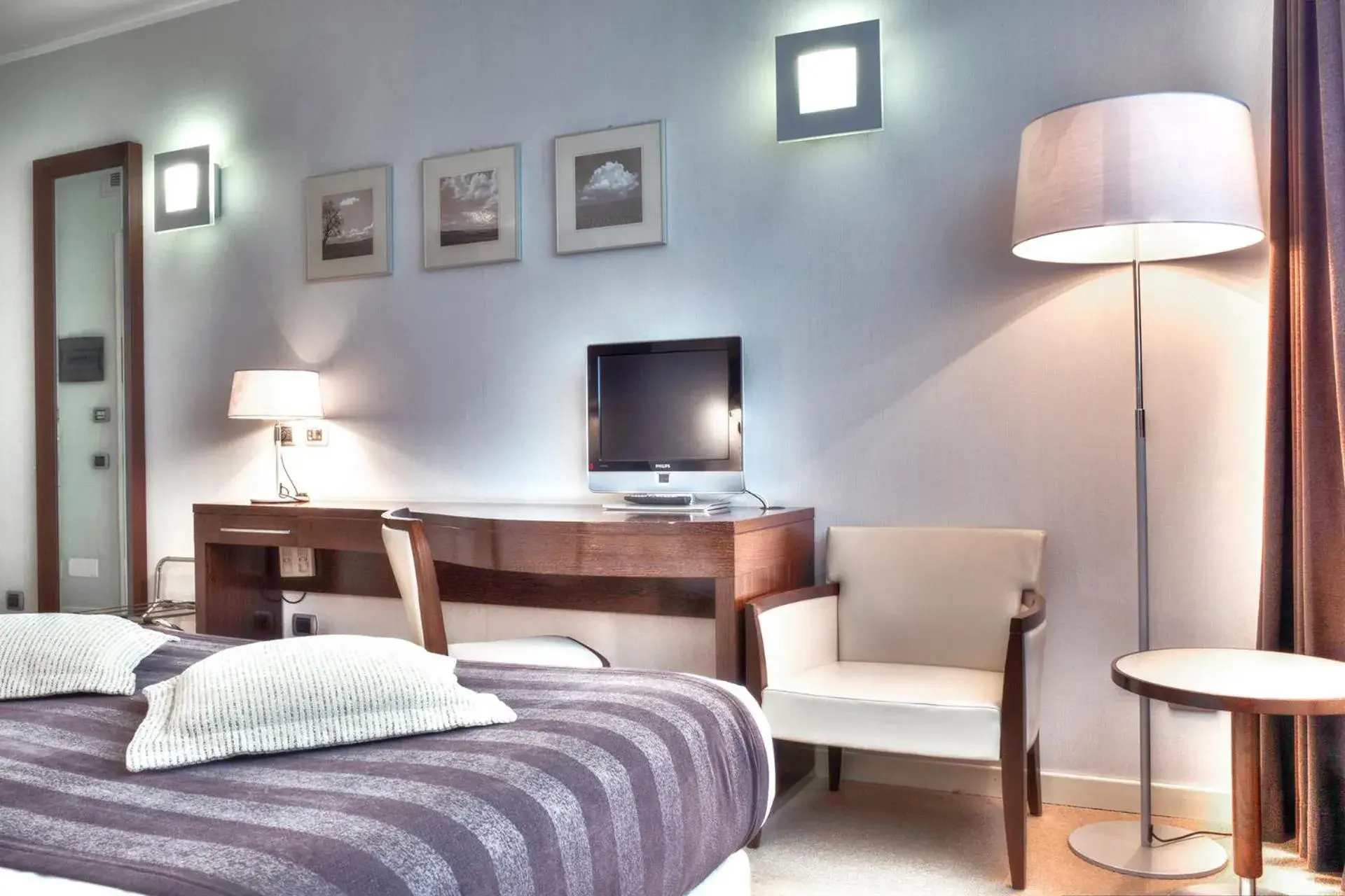 Bedroom, Seating Area in Italiana Hotels Cosenza