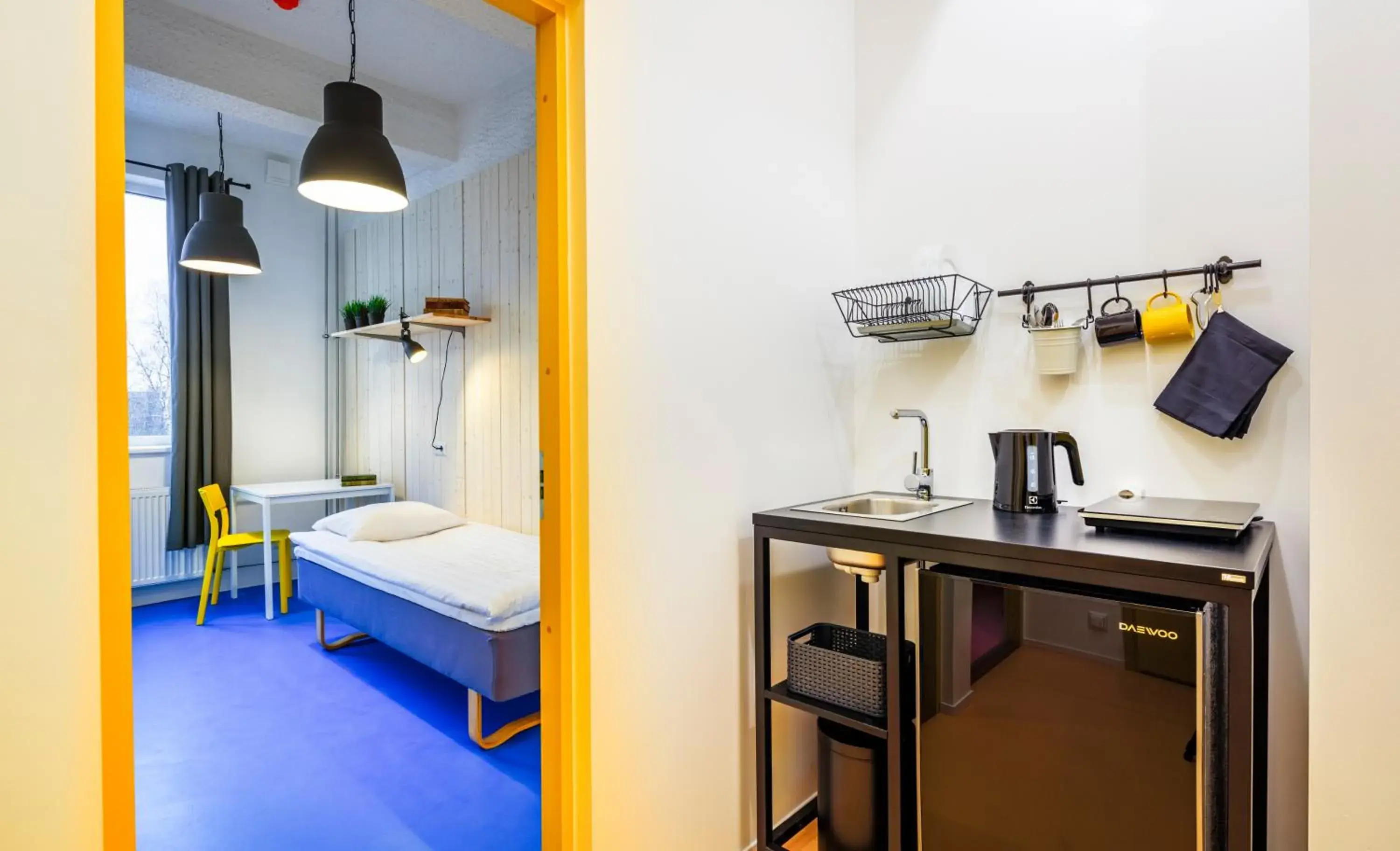 Kitchen or kitchenette, Bed in Hektor Design Hostel