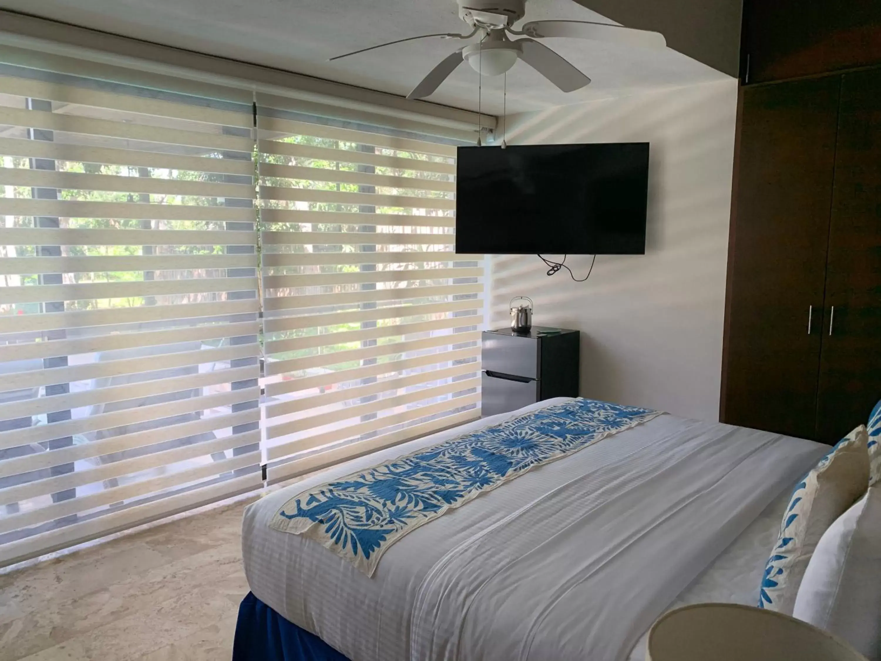 Bed in Xaha Villas Suites & Golf Resort