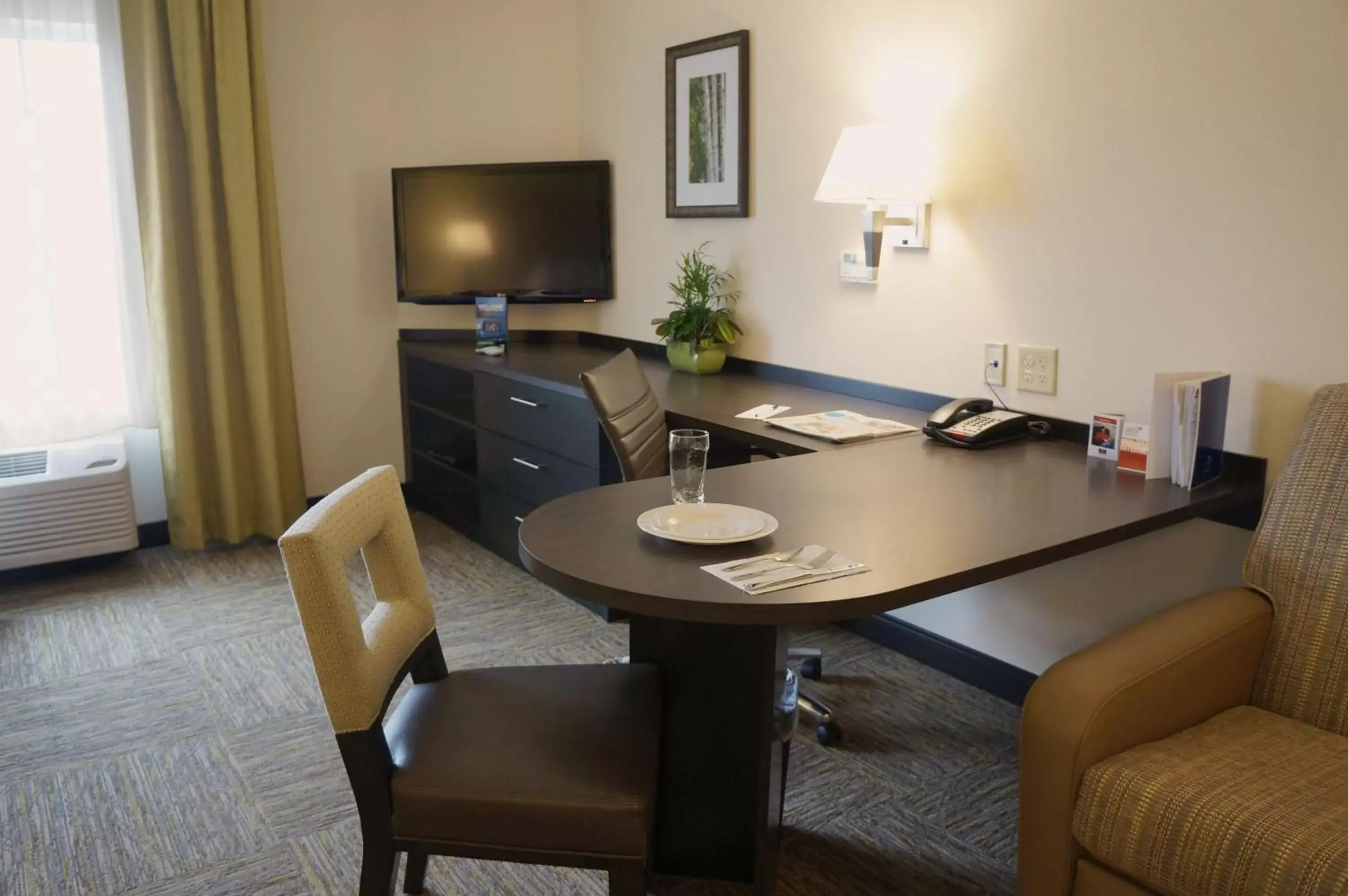 Photo of the whole room, TV/Entertainment Center in Candlewood Suites Harrisburg-Hershey, an IHG Hotel