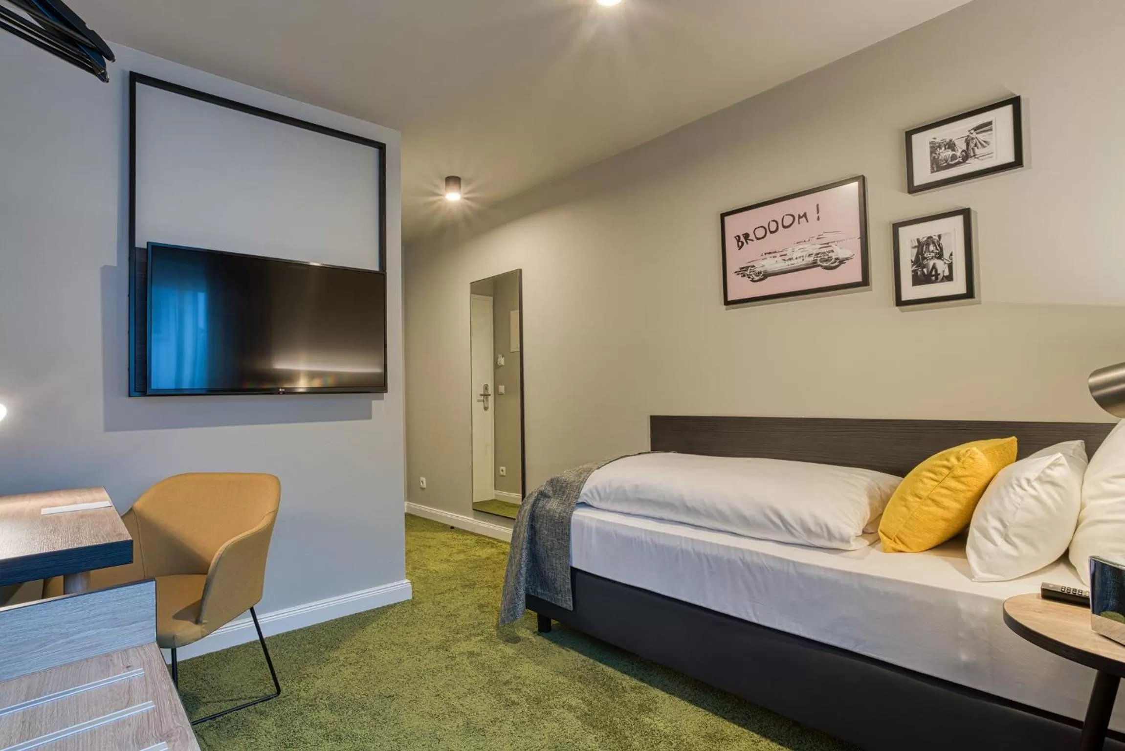 Photo of the whole room, TV/Entertainment Center in NYCE Hotel Ingolstadt