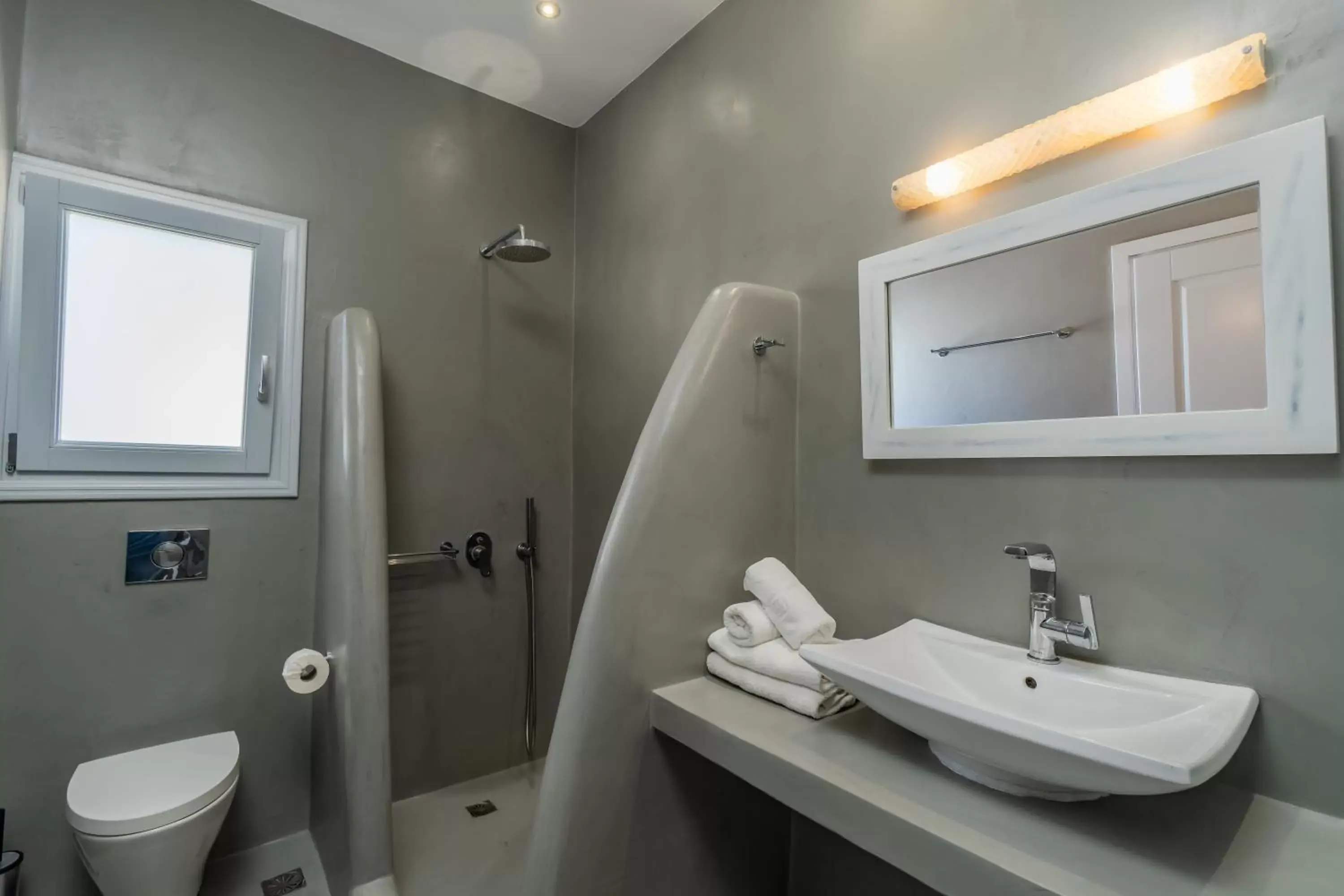 Bathroom in Central Fira Suites