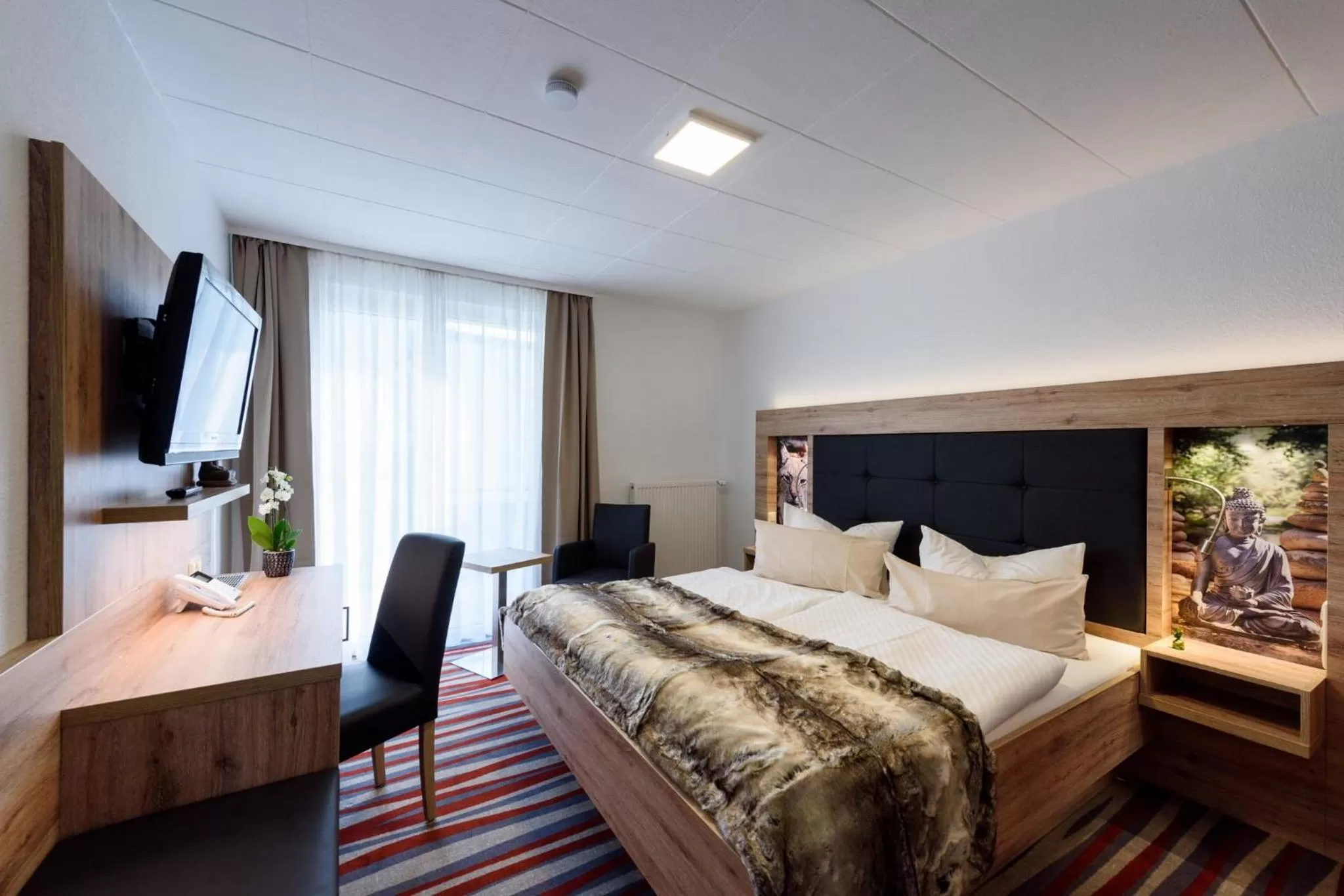 Photo of the whole room, Bed in Wellness & Ayurveda Hotel Am Eichenberg