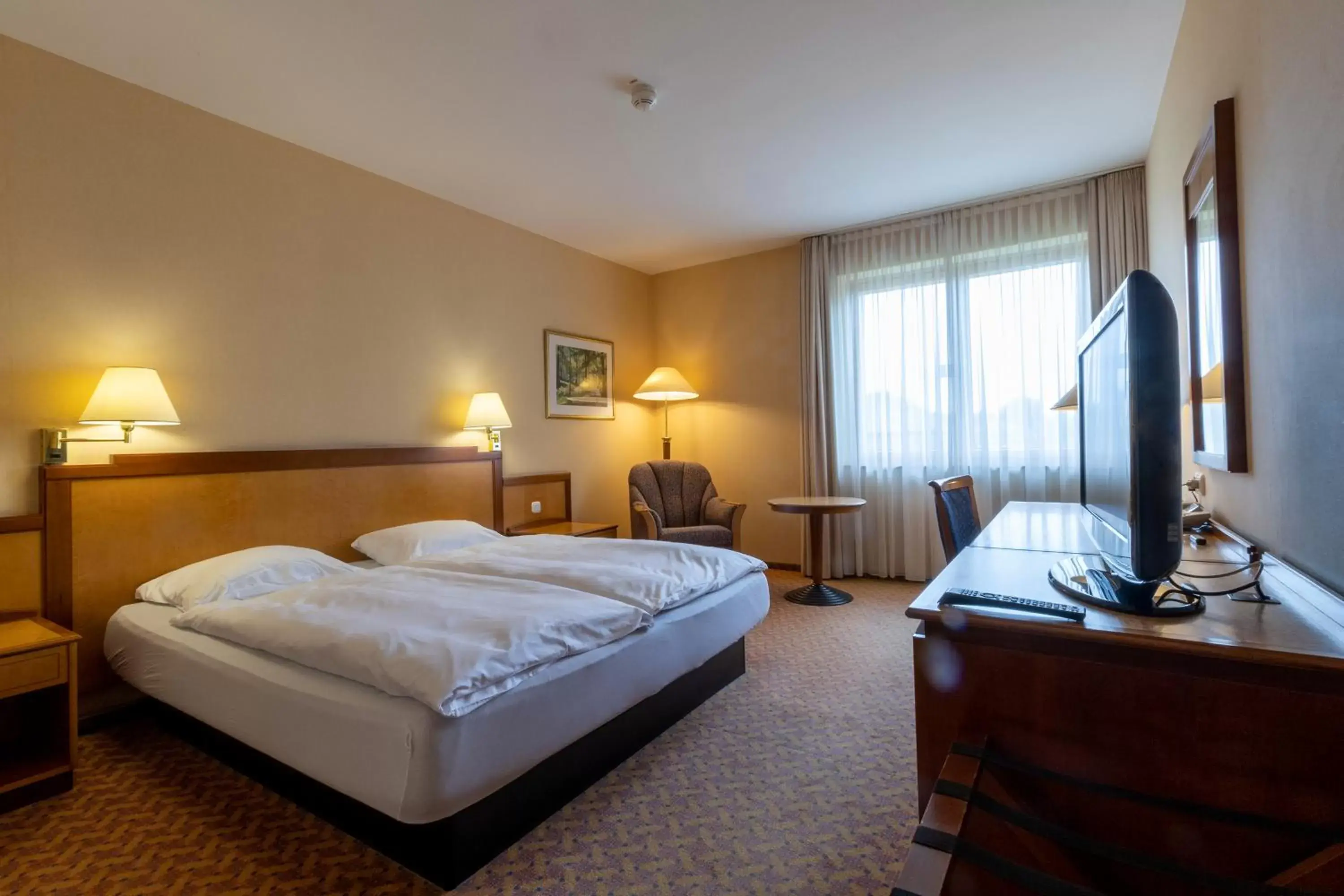 Bed in Mercure Hotel Gera City