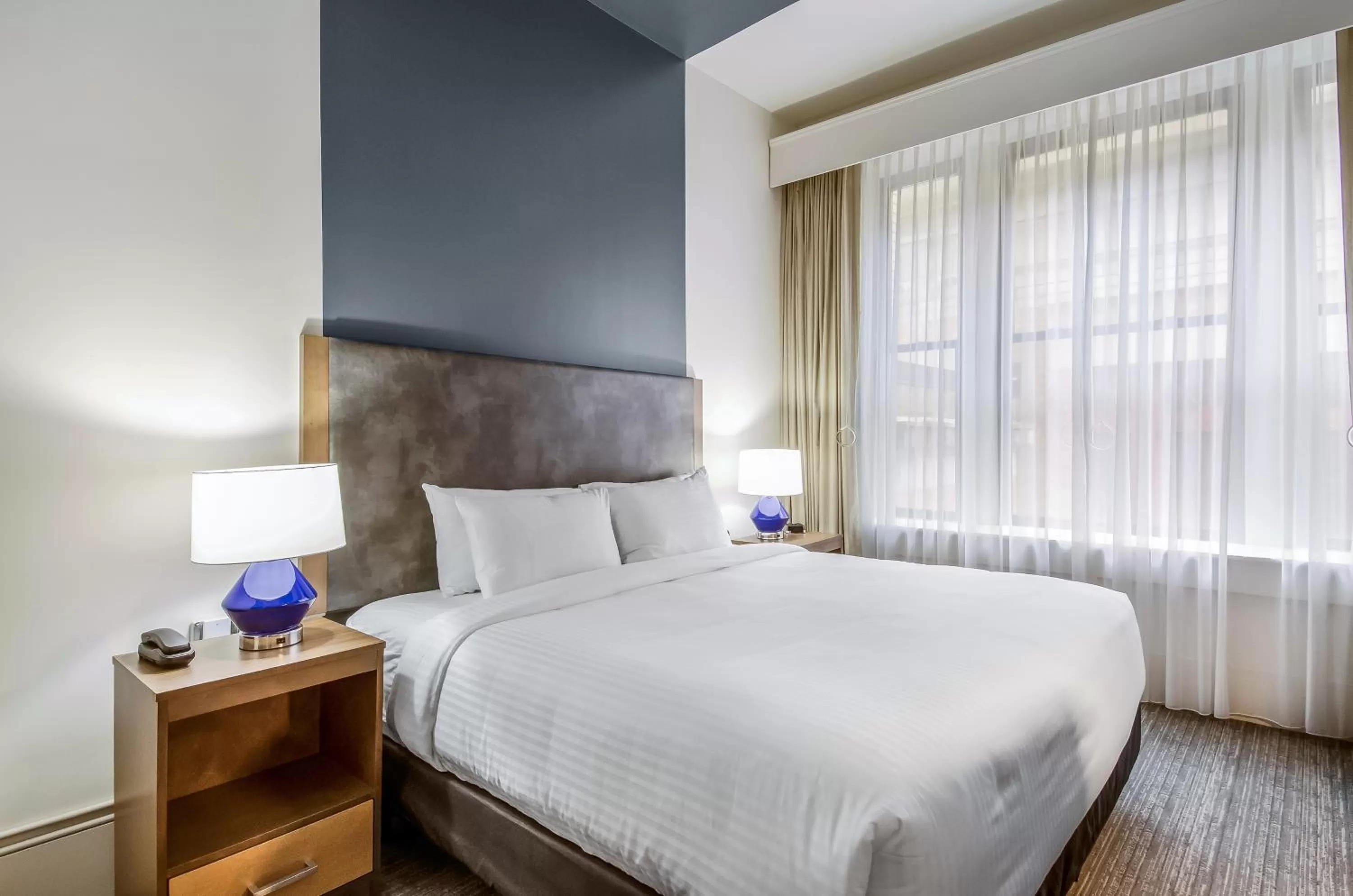 Bed in New Bedford Harbor Hotel, an Ascend Collection Hotel