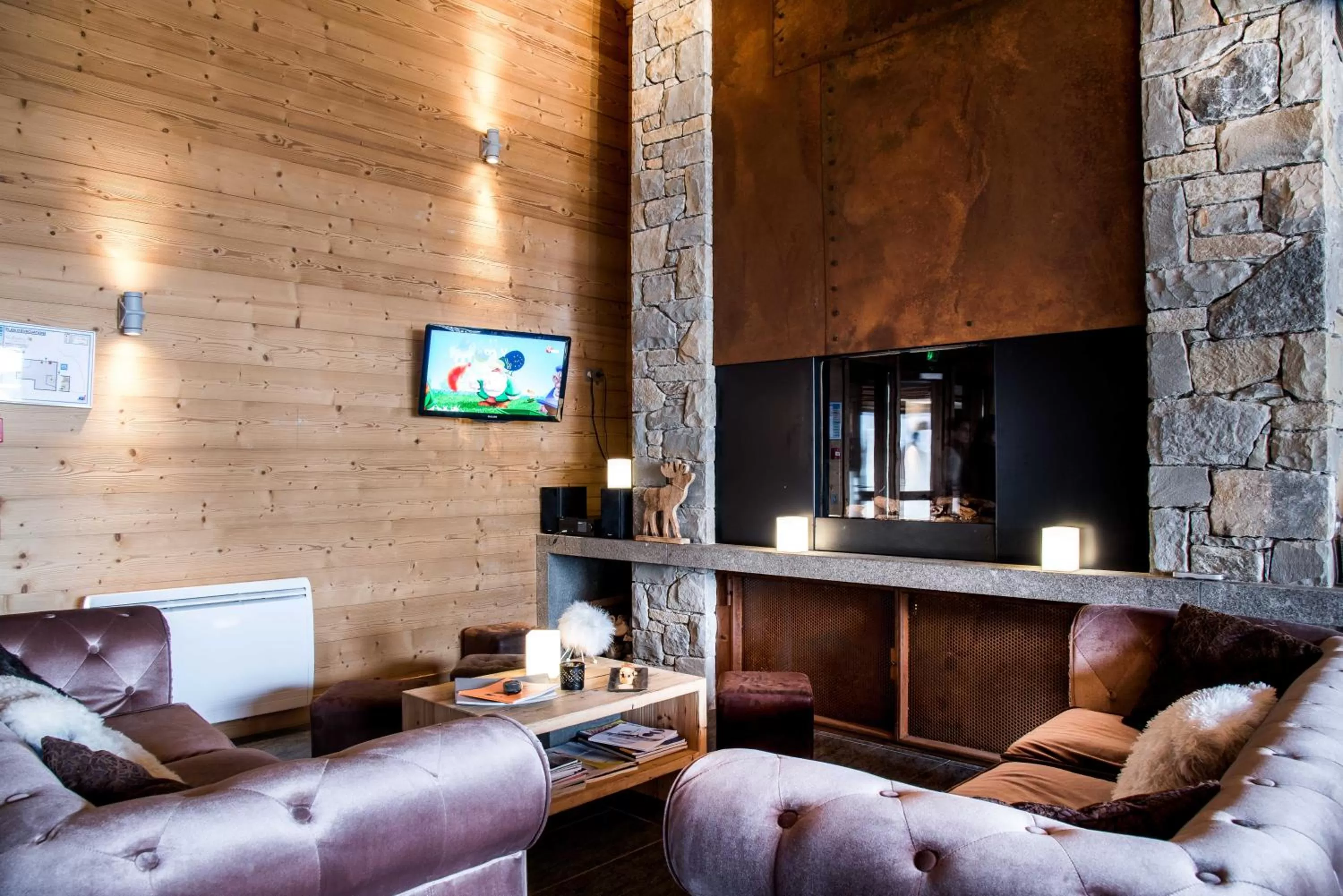 Communal lounge/ TV room in Résidence - Les Grandes Alpes