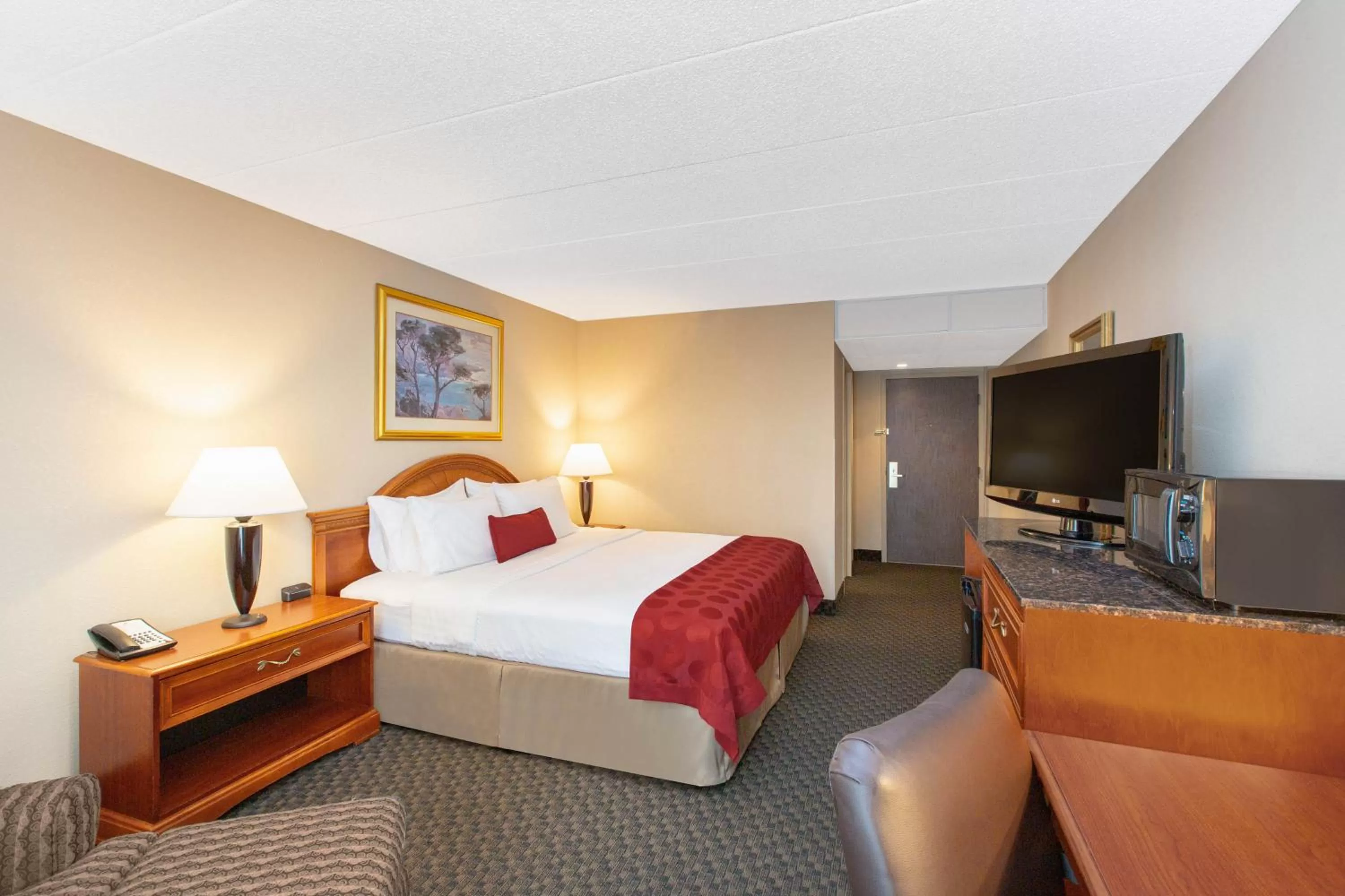 Bed in Ramada by Wyndham Midtown Grand Island