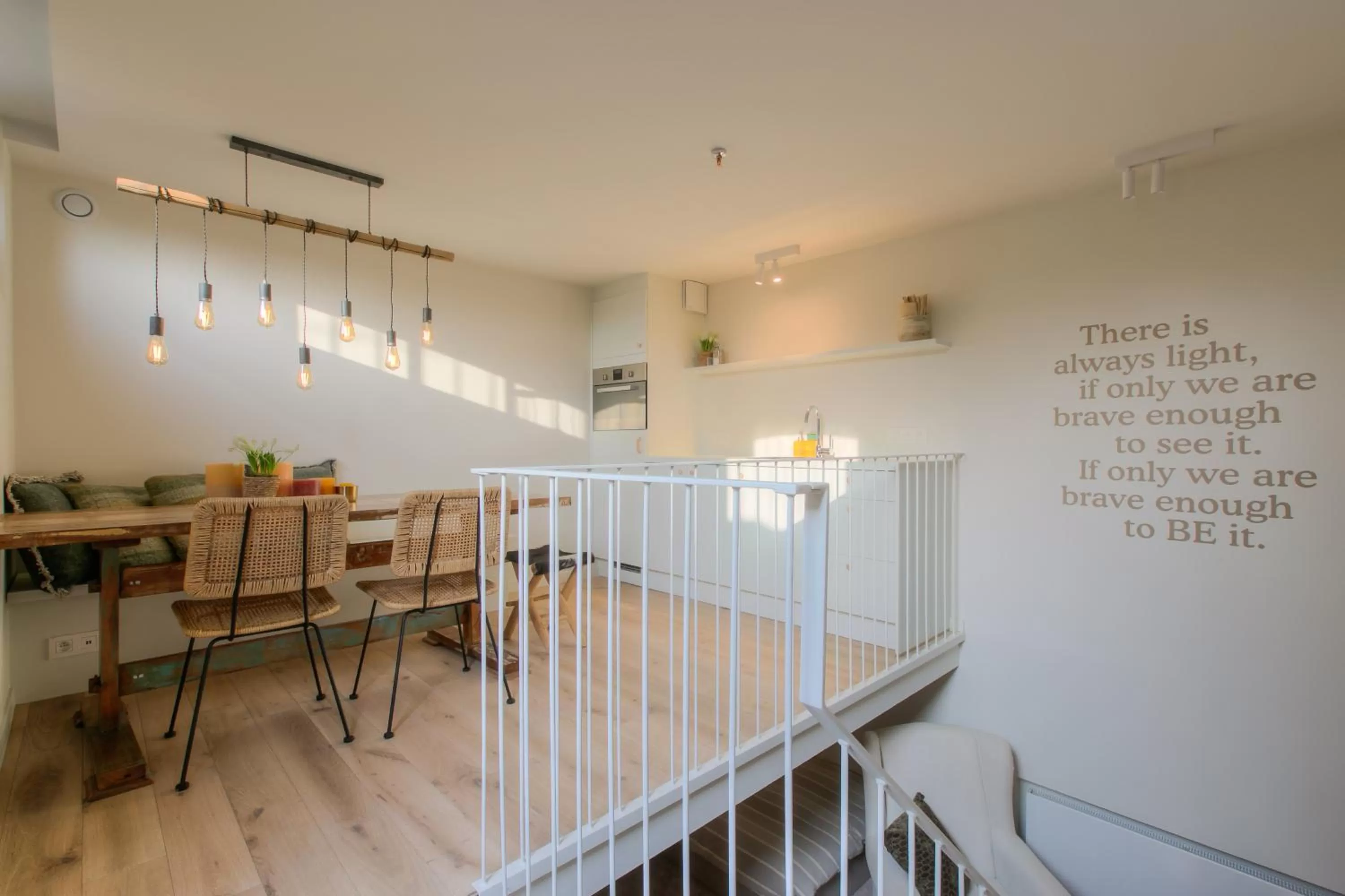 Dining area in Logie Marie with hottub in the garden