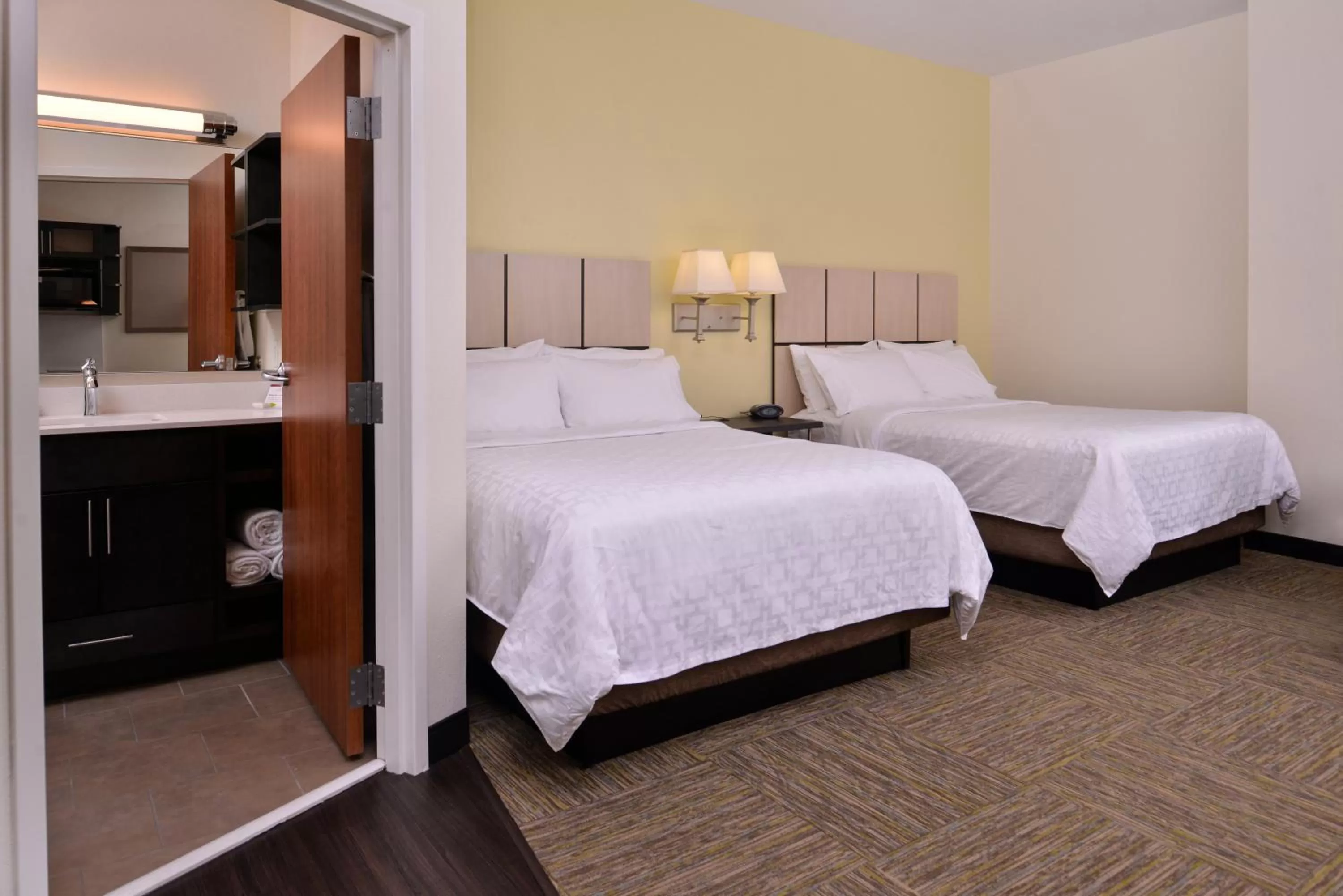 Photo of the whole room, Bed in Candlewood Suites Terre Haute by IHG