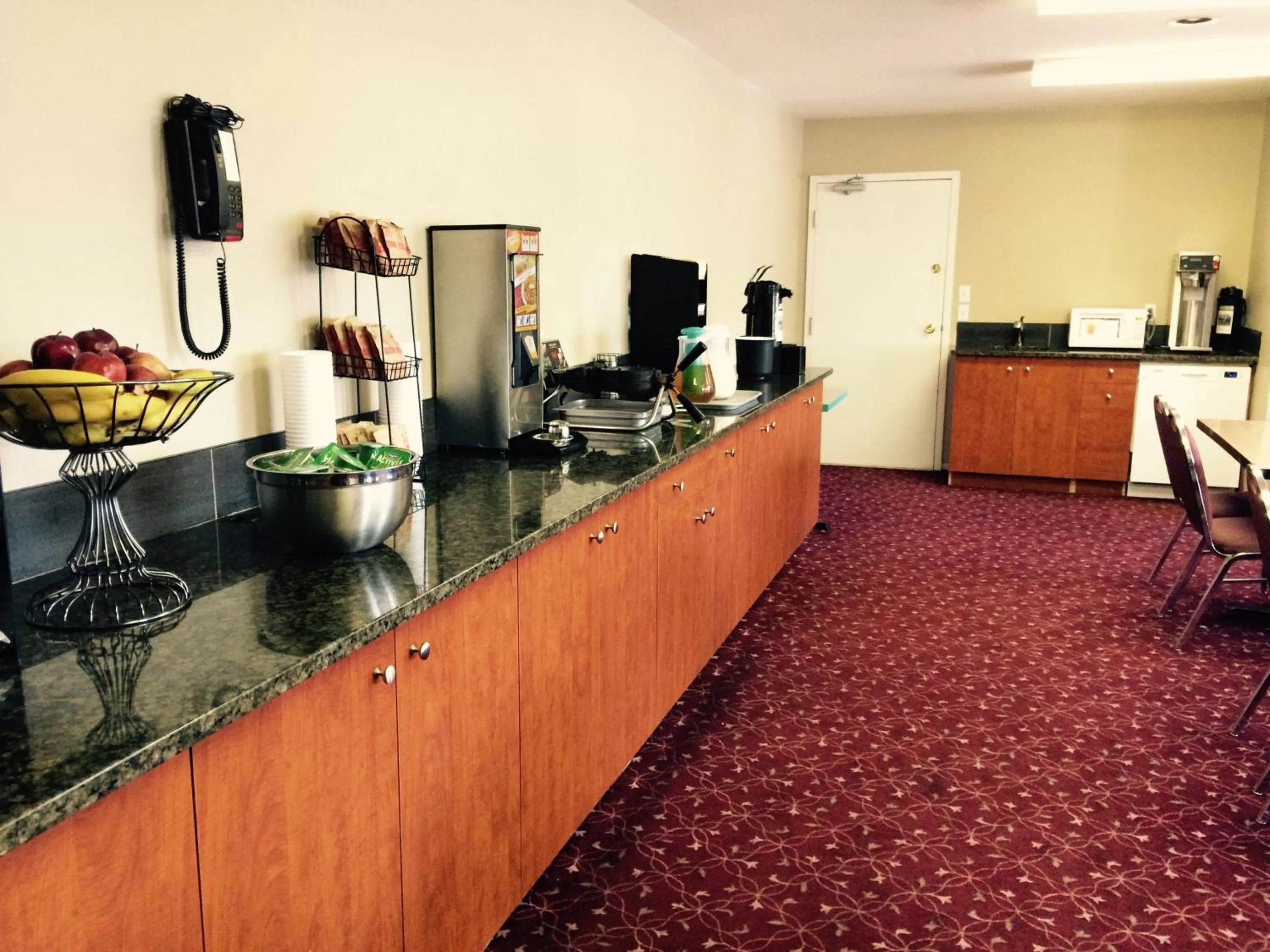 Kitchen or kitchenette in Super 8 by Wyndham West Kelowna BC