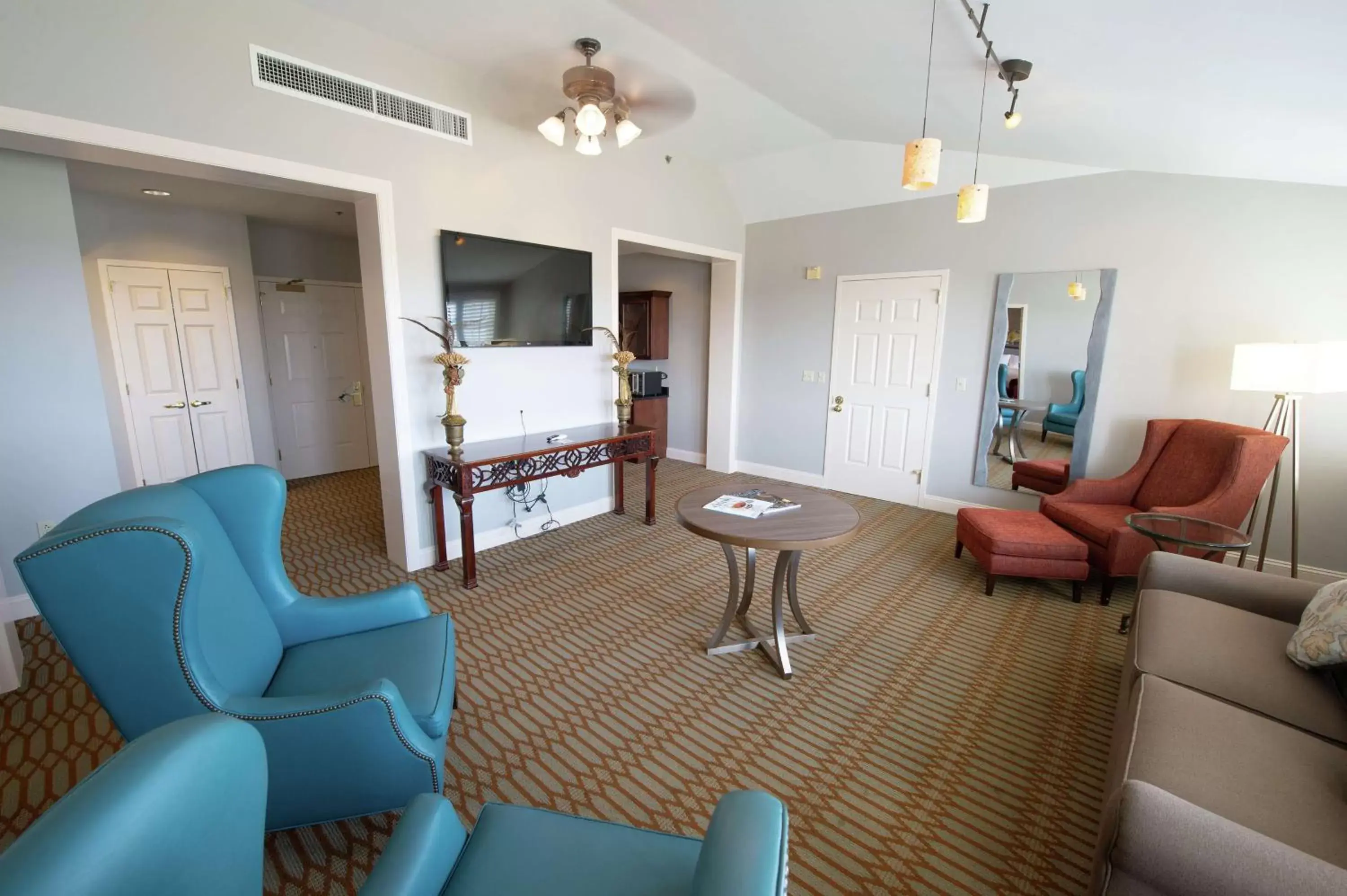 Bed, Seating Area in Virginia Crossings Hotel, Tapestry Collection by Hilton