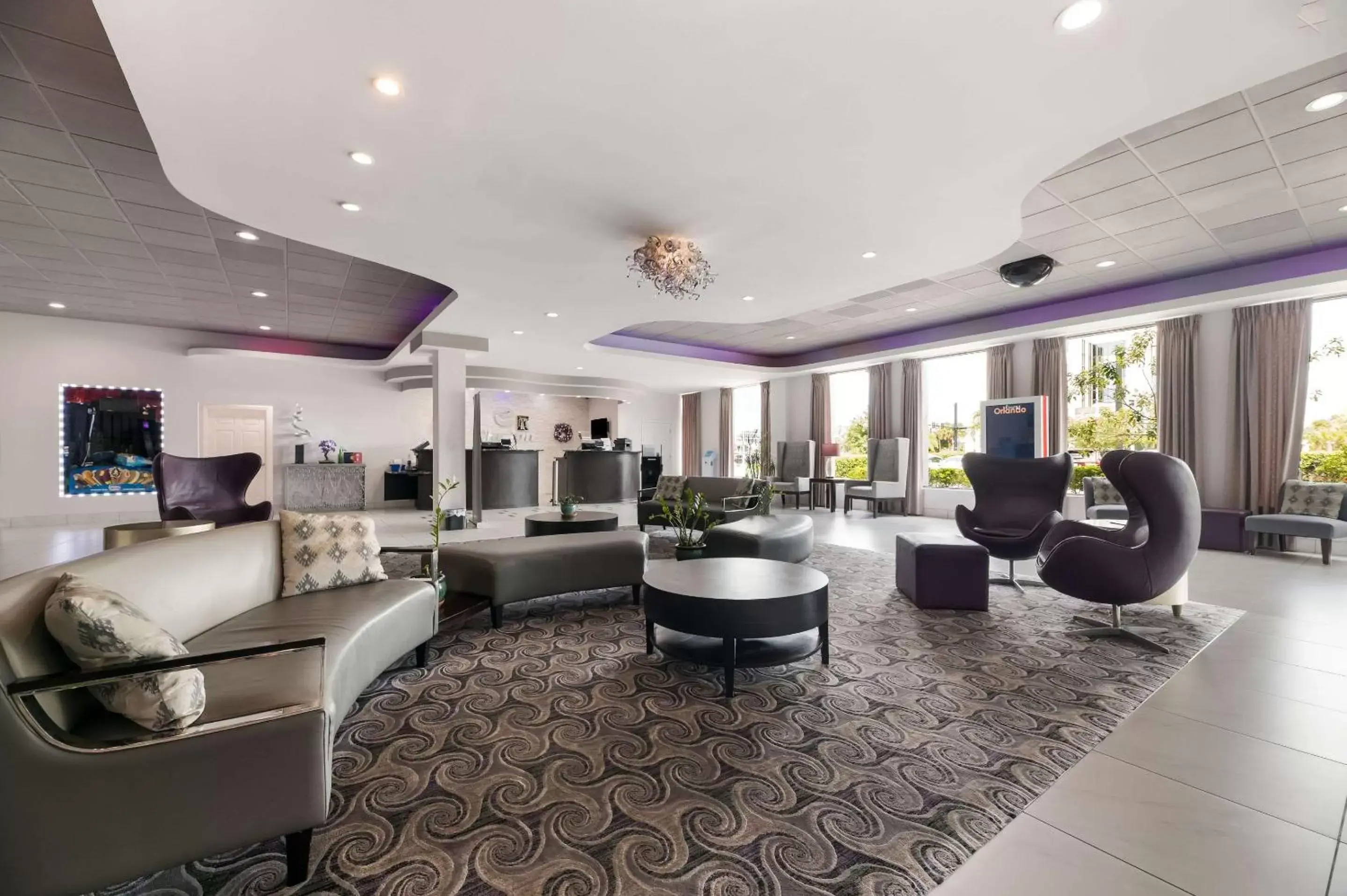 Lobby or reception, Lounge/Bar in Clarion Inn & Suites Across From Universal Orlando Resort
