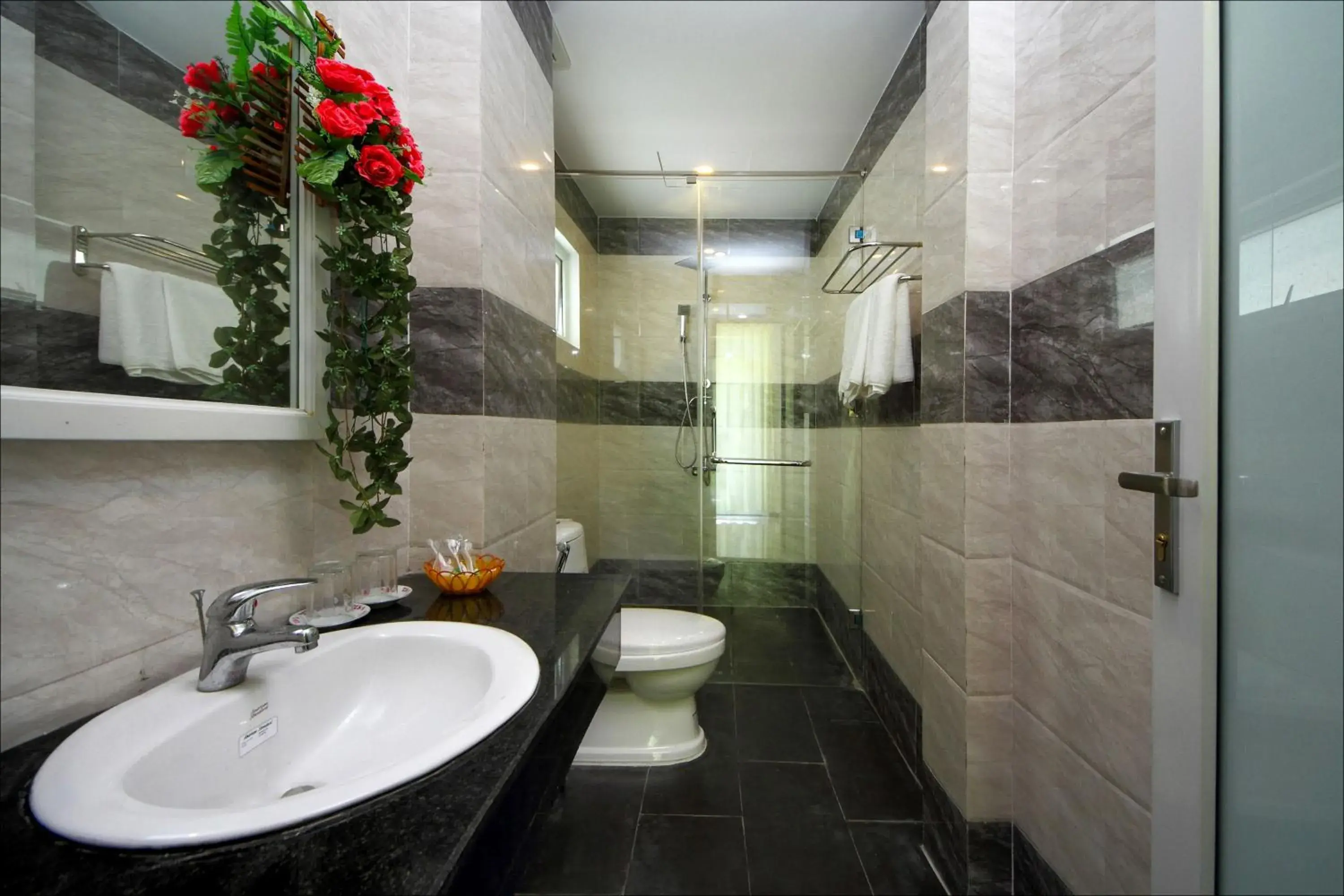 Toilet, Bathroom in Flame Flowers Homestay