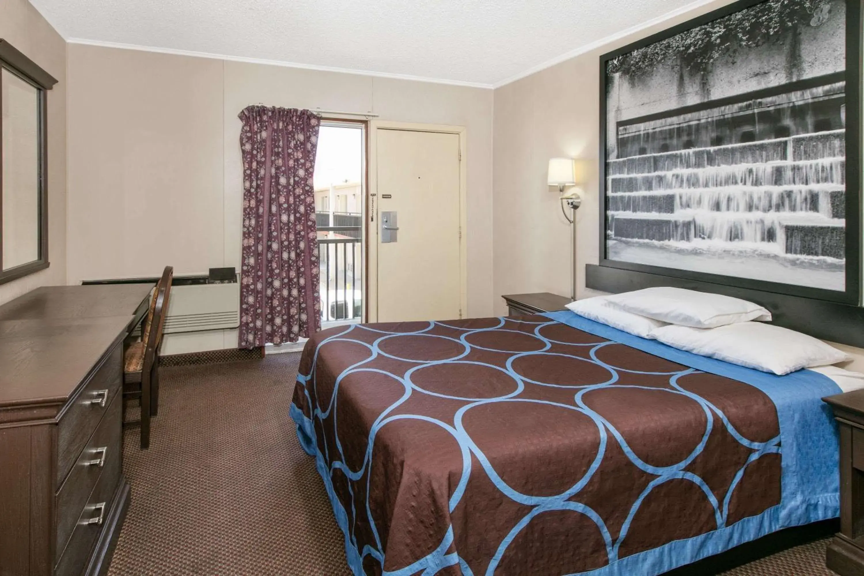 Photo of the whole room, Bed in Super 8 by Wyndham Lubbock Civic Center North