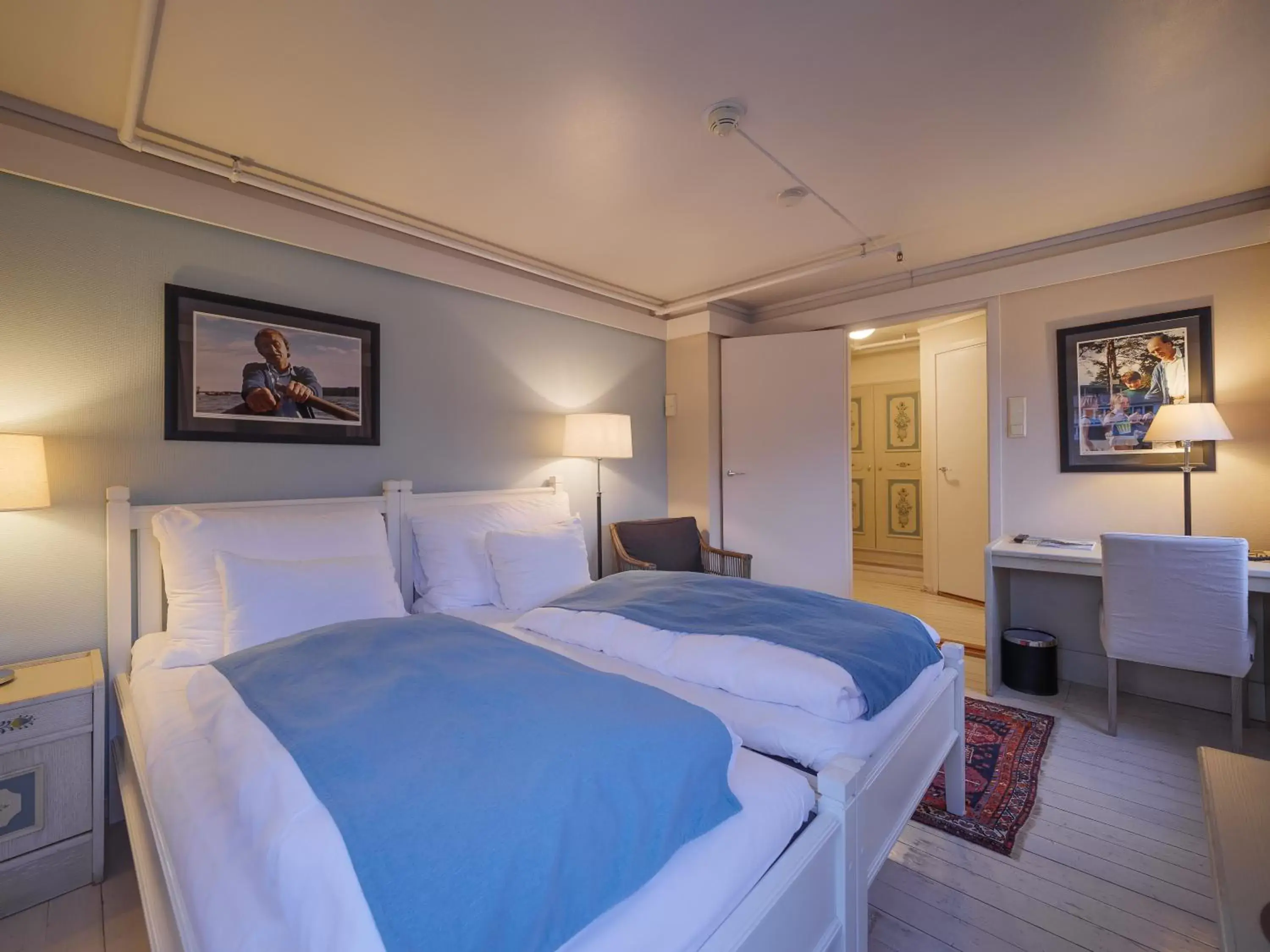 Photo of the whole room, Bed in Strand Hotel Fevik - by Classic Norway Hotels