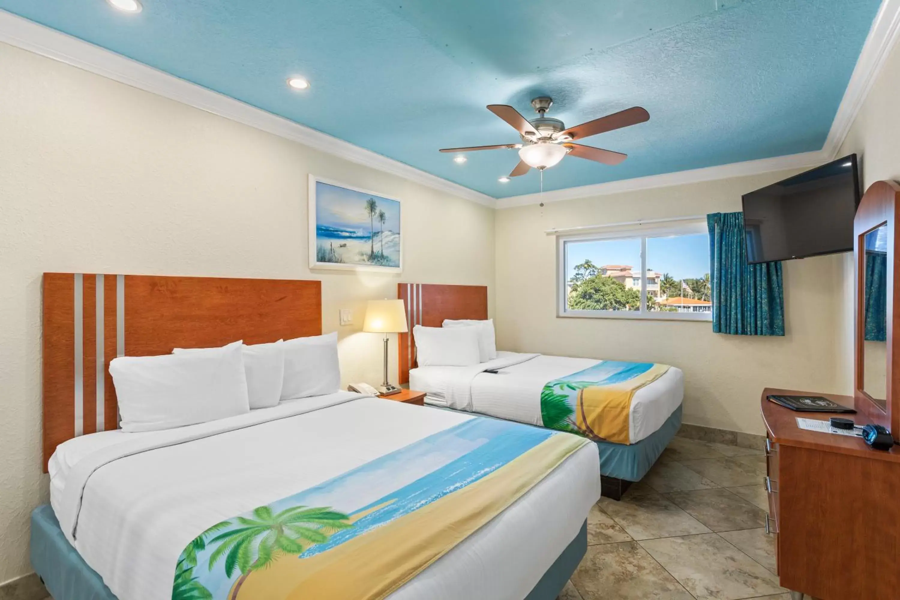Deluxe One Bedroom Suite: 2 Queen Beds and 2 Sleeper Sofas in Bay Palms Waterfront Resort - Hotel and Marina