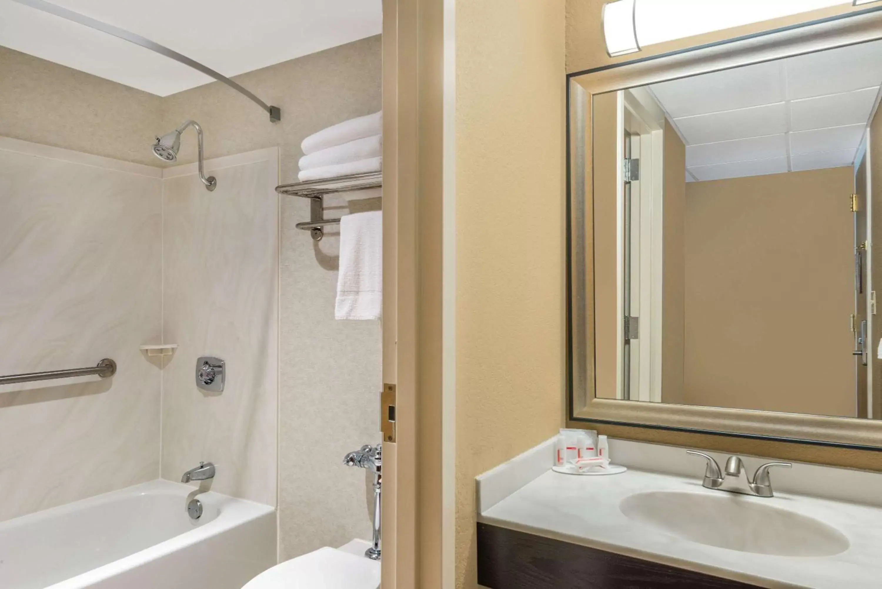 Bathroom in Ramada by Wyndham Paintsville Hotel & Conference Center