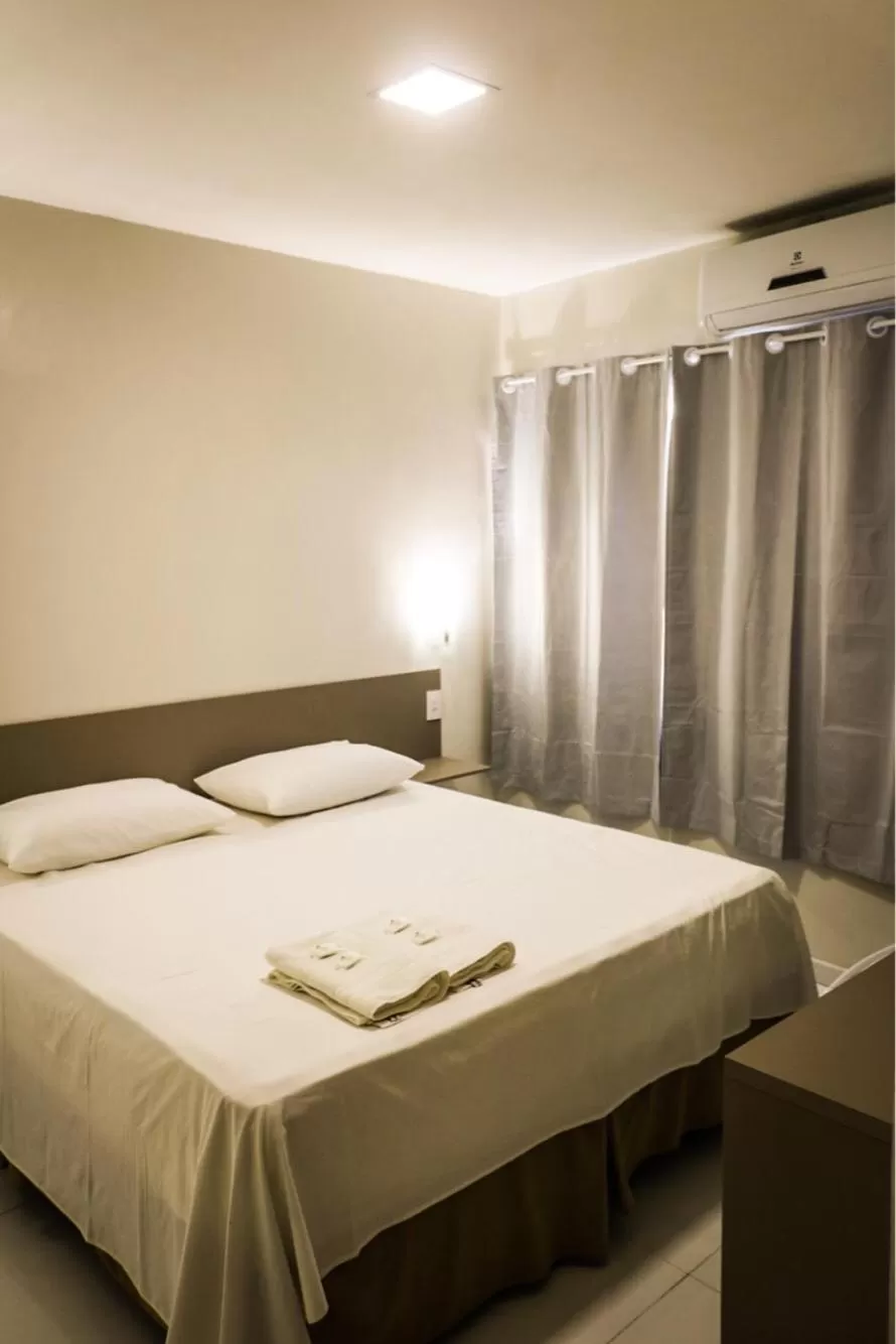 Bed in Pousada Vila do Carmo