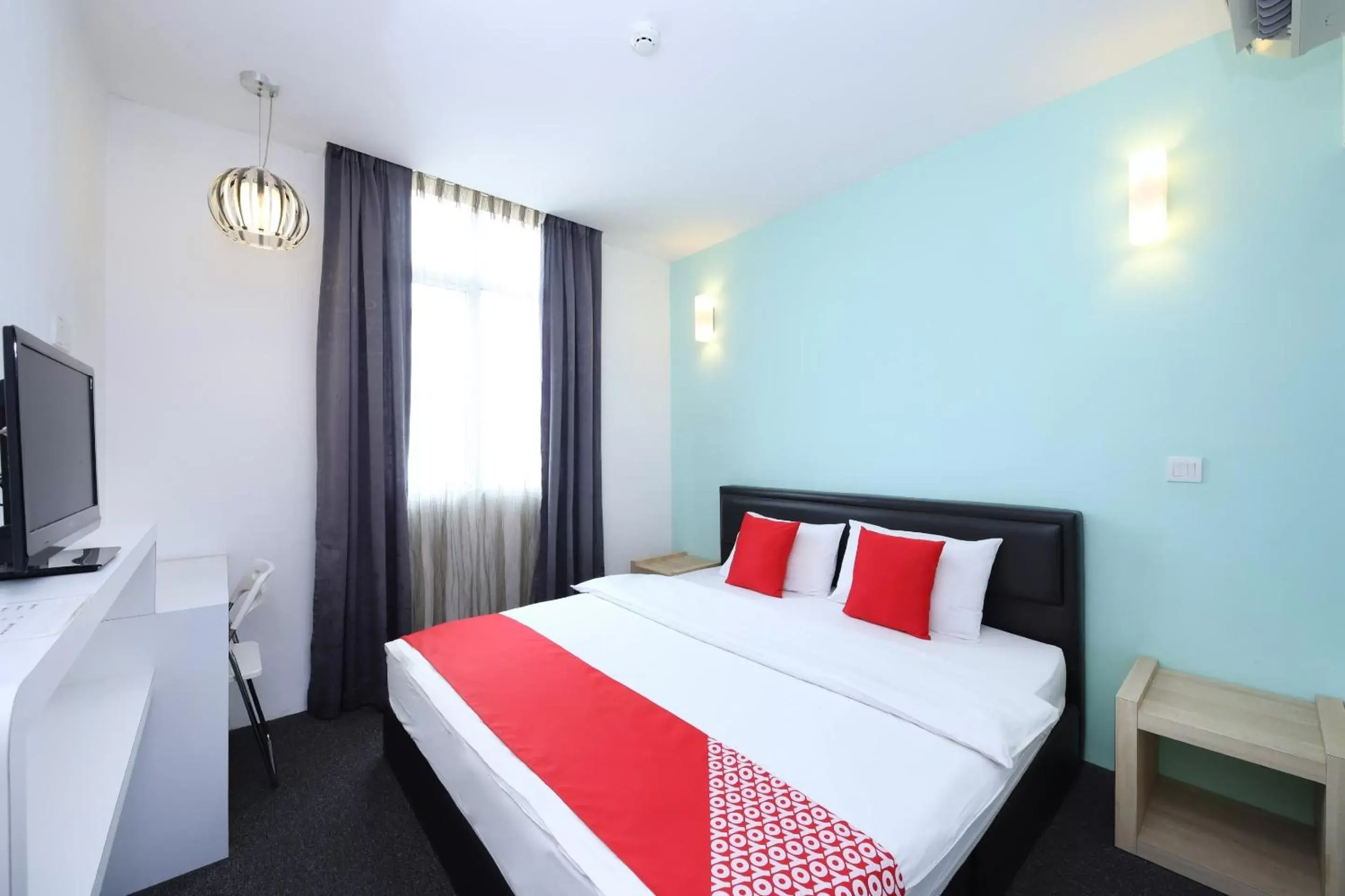 Bedroom in OYO 442 Marvelton Hotel