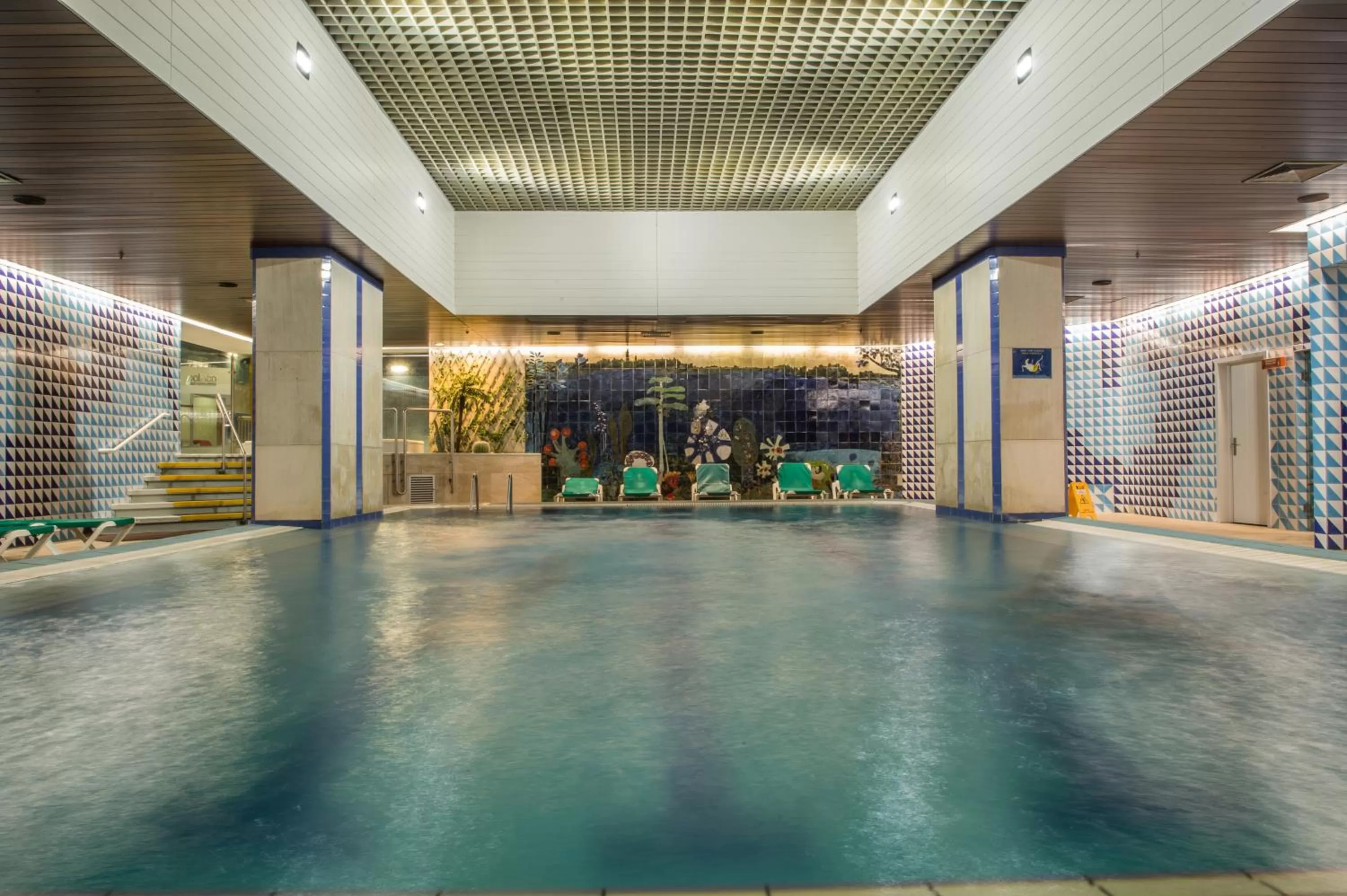 Swimming pool in Porto Palácio Hotel by The Editory