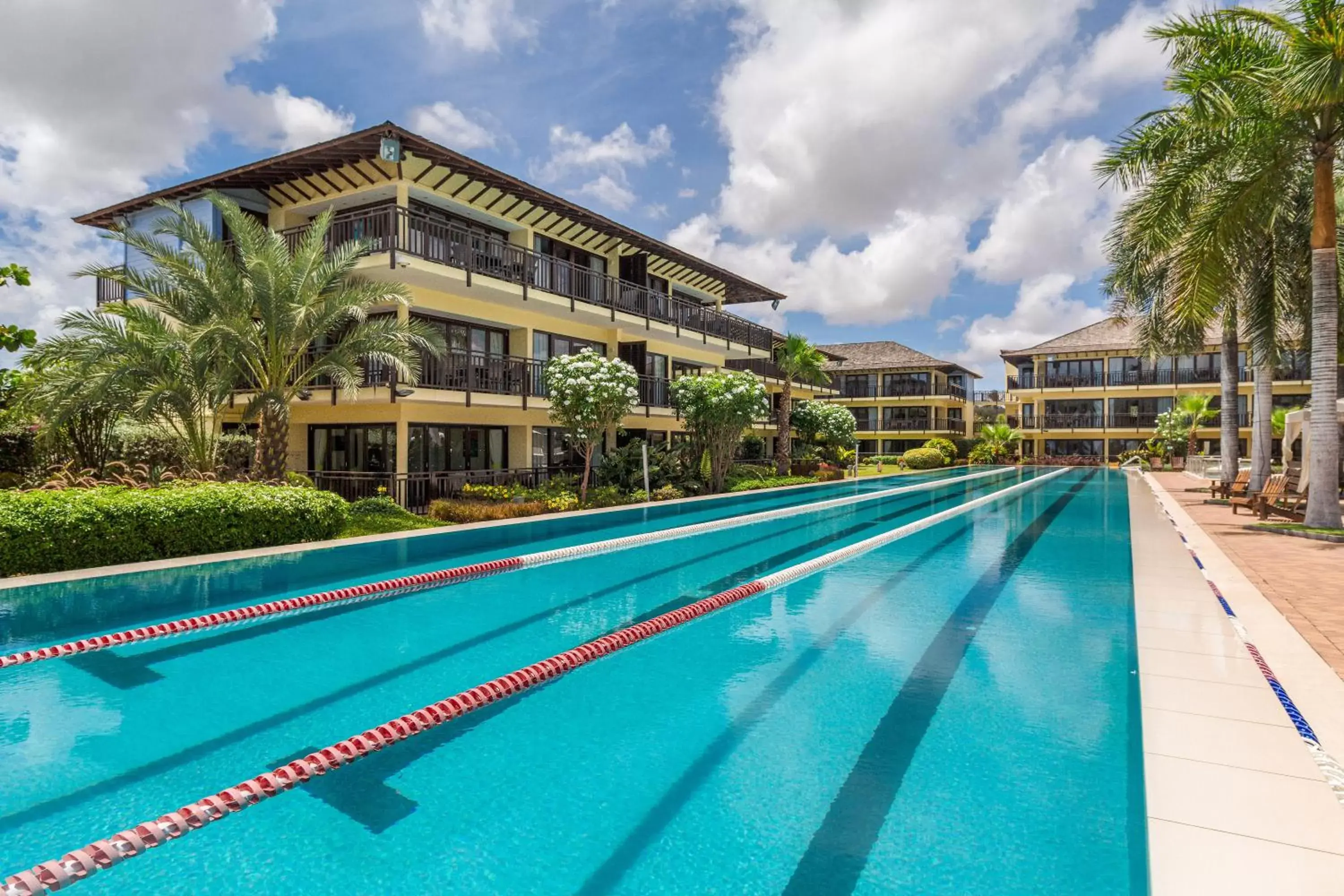 Swimming pool, Property Building in LionsDive Beach Resort