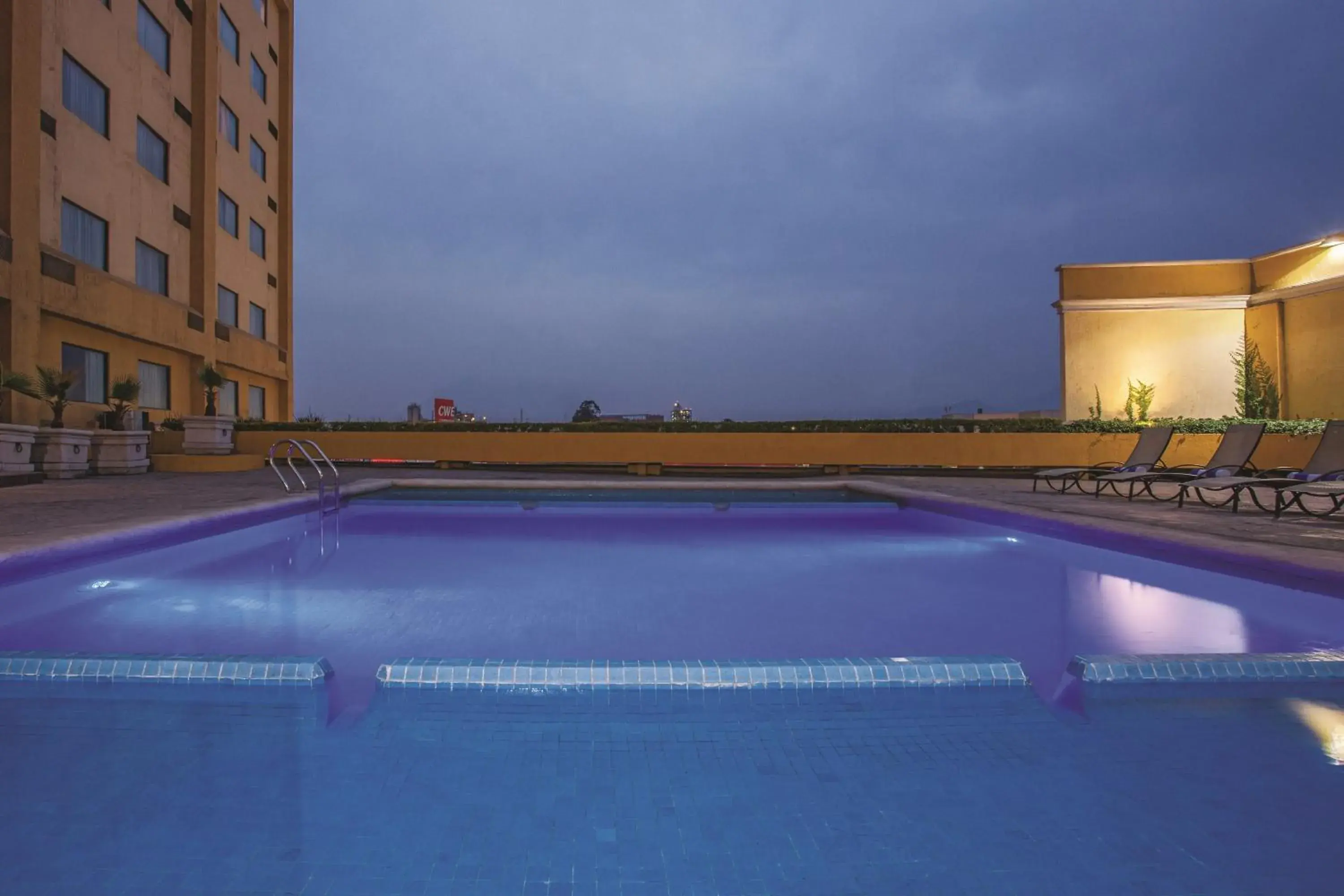 Swimming Pool in CHN Hotel Monterrey Norte, Trademark Collection by Wyndham