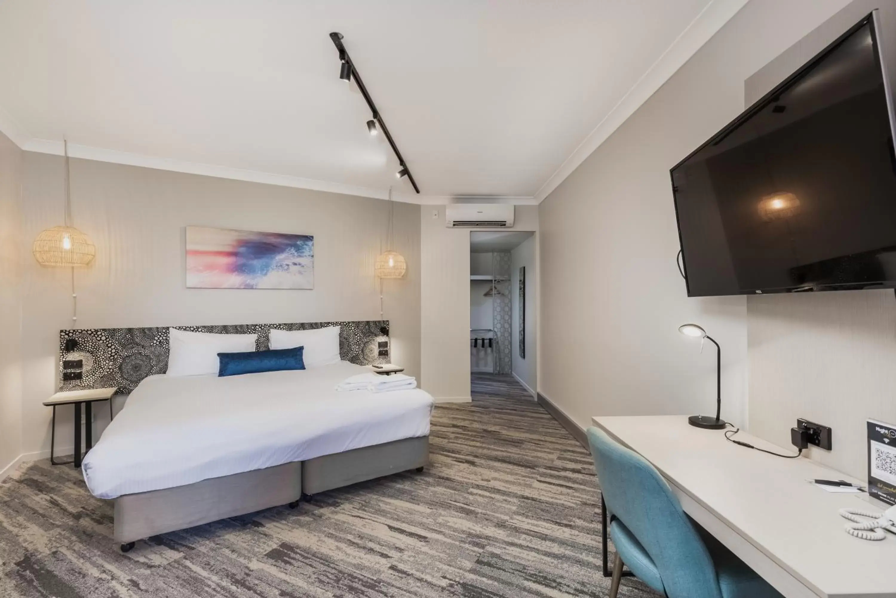 Bedroom, TV/Entertainment Center in Mermaid Waters Hotel by Nightcap Plus