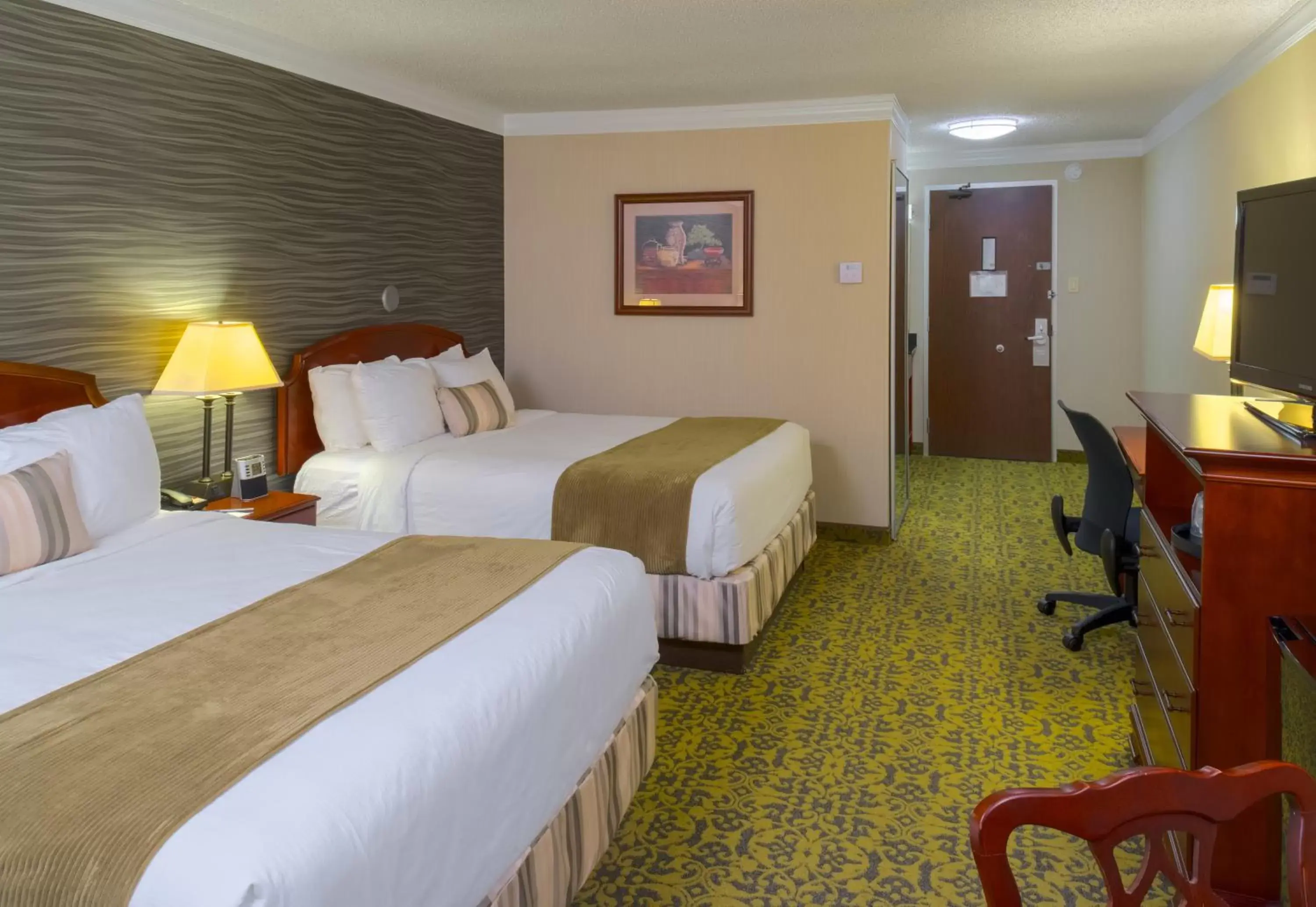 Bed in Salt Lake Plaza Hotel SureStay Collection by Best Western