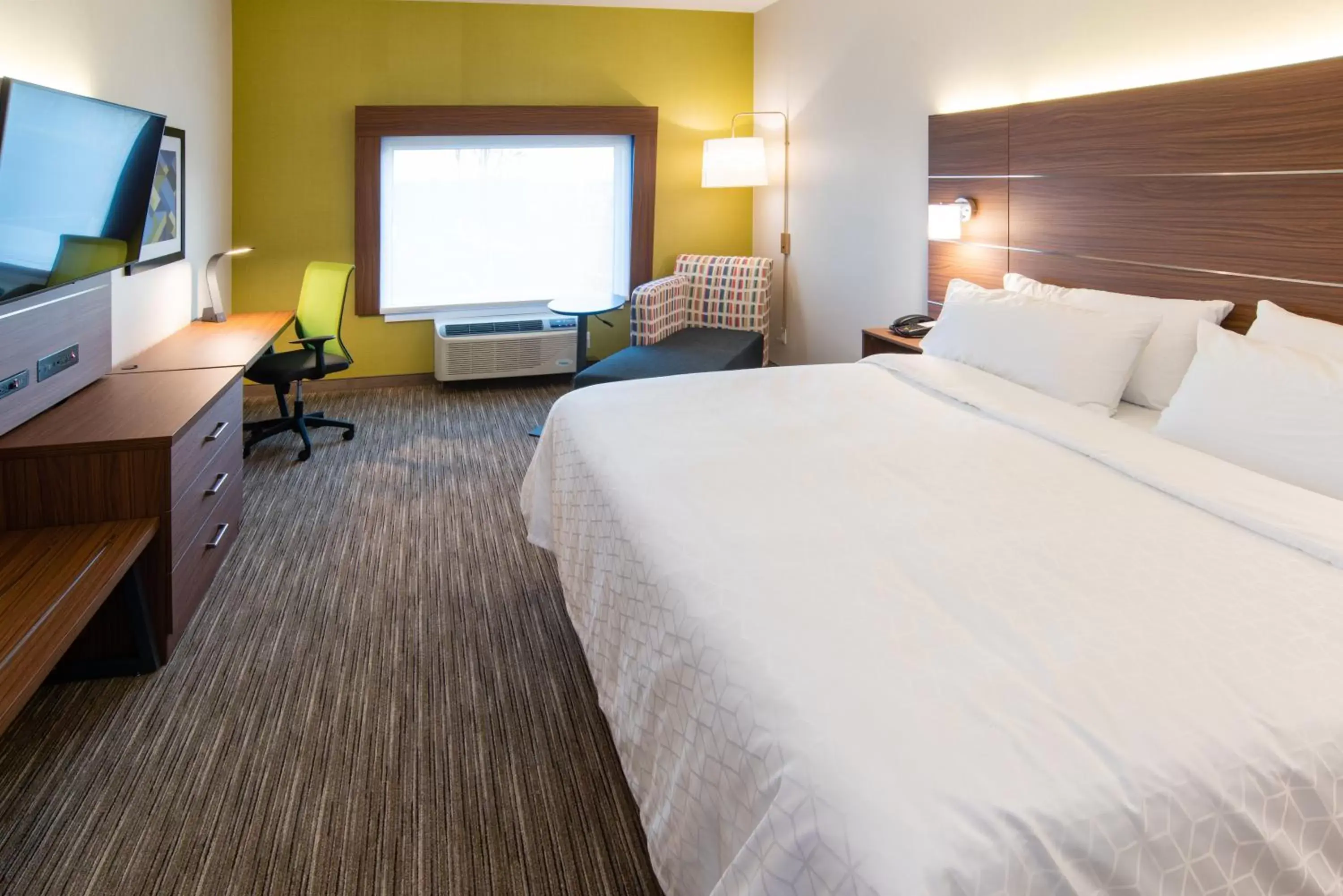 Bed in Holiday Inn Express & Suites - North Battleford, an IHG Hotel