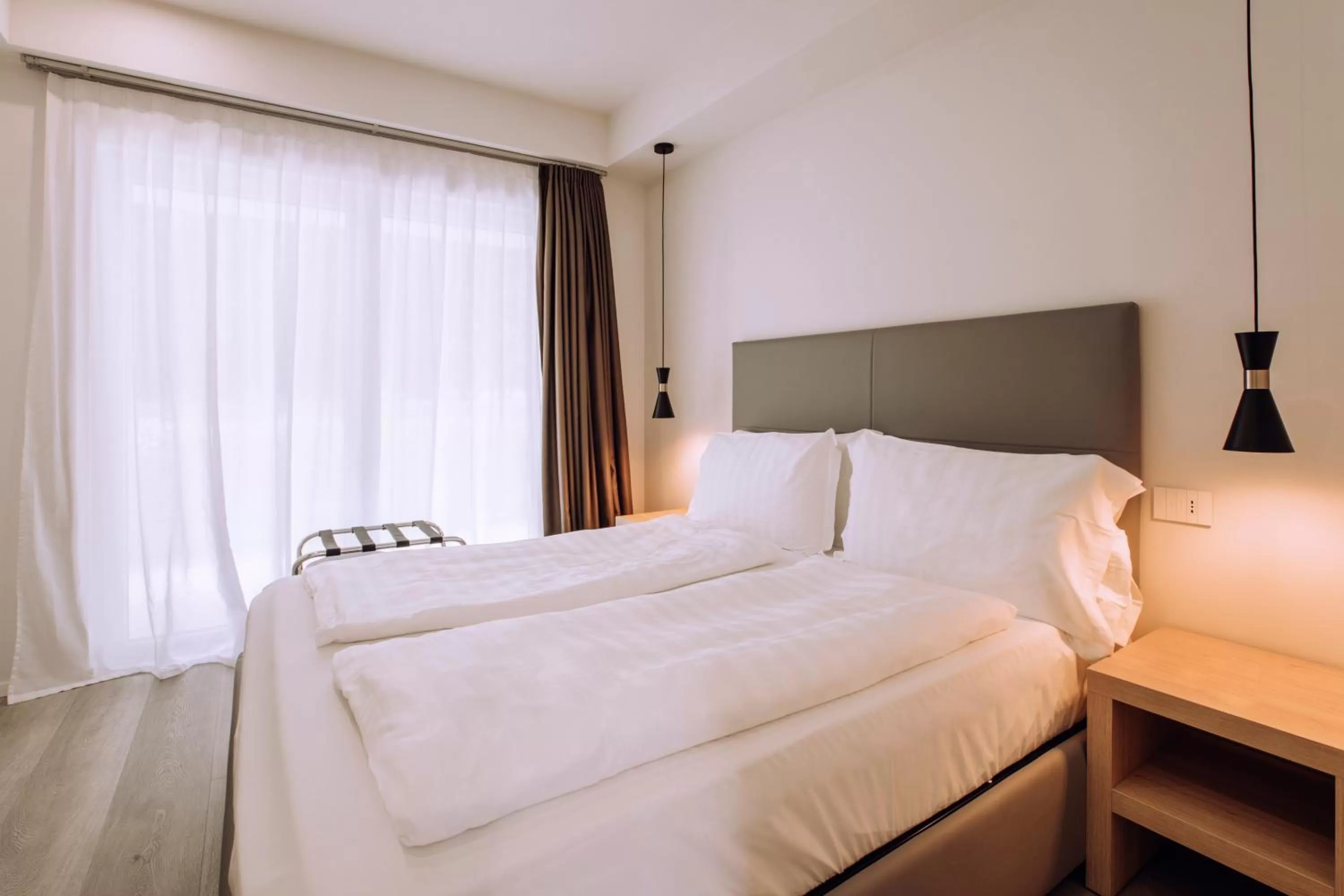 Bed in Ah Porticcioli Boutique Apartments