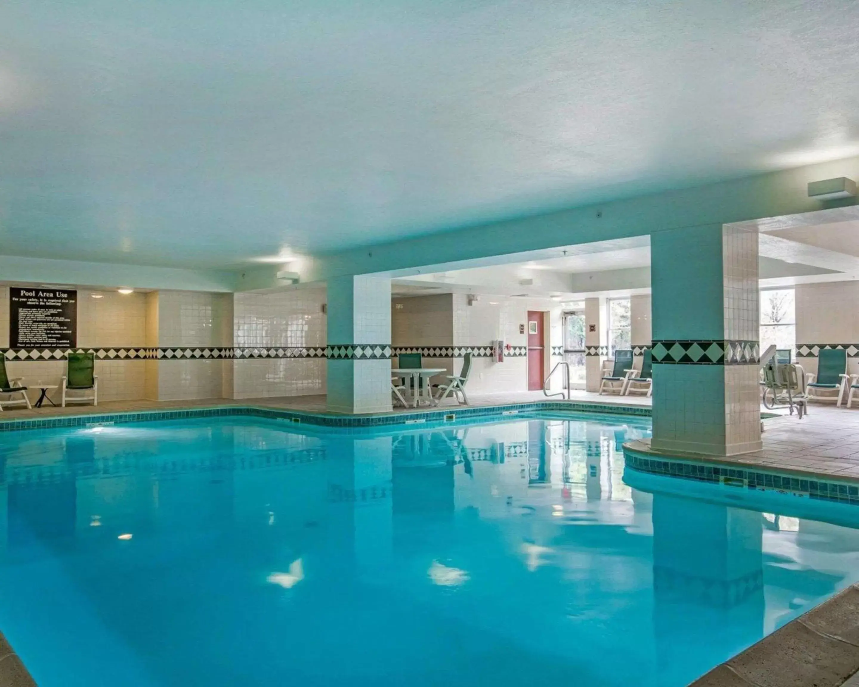 On site, Swimming Pool in Comfort Inn & Suites Near Burke Mountain