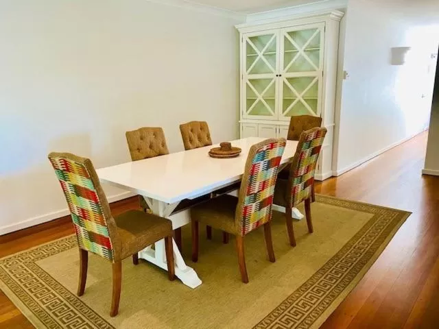 Dining area in BeachView Apartments at Villa Paradiso