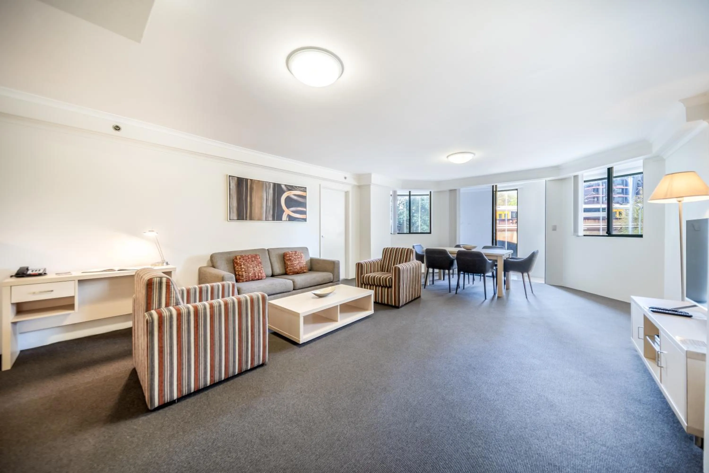 Living room in Oaks Sydney Castlereagh Suites
