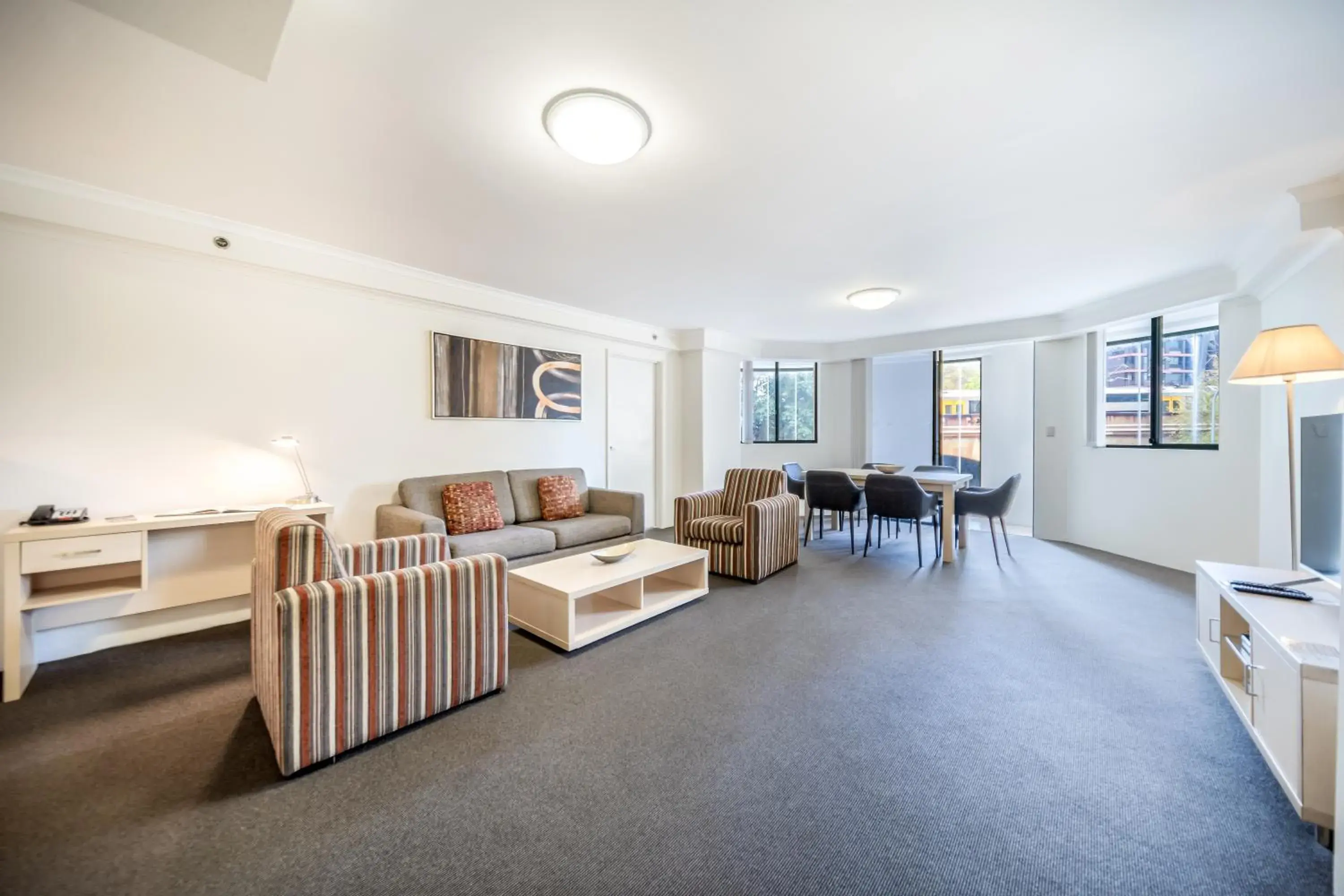 Living room, Seating Area in Oaks Sydney Castlereagh Suites
