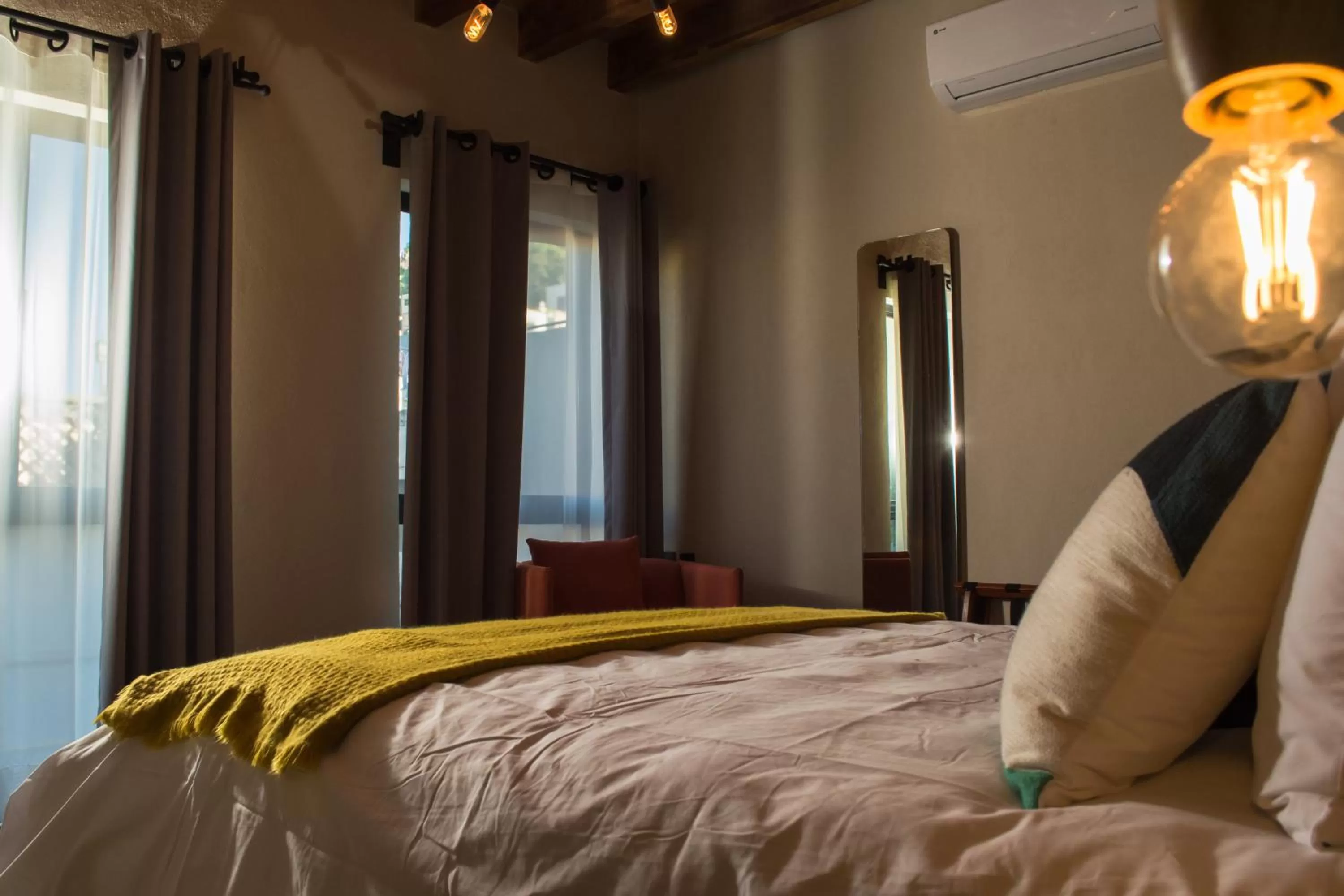 Bed in Antigua Trece Hotel Fusión