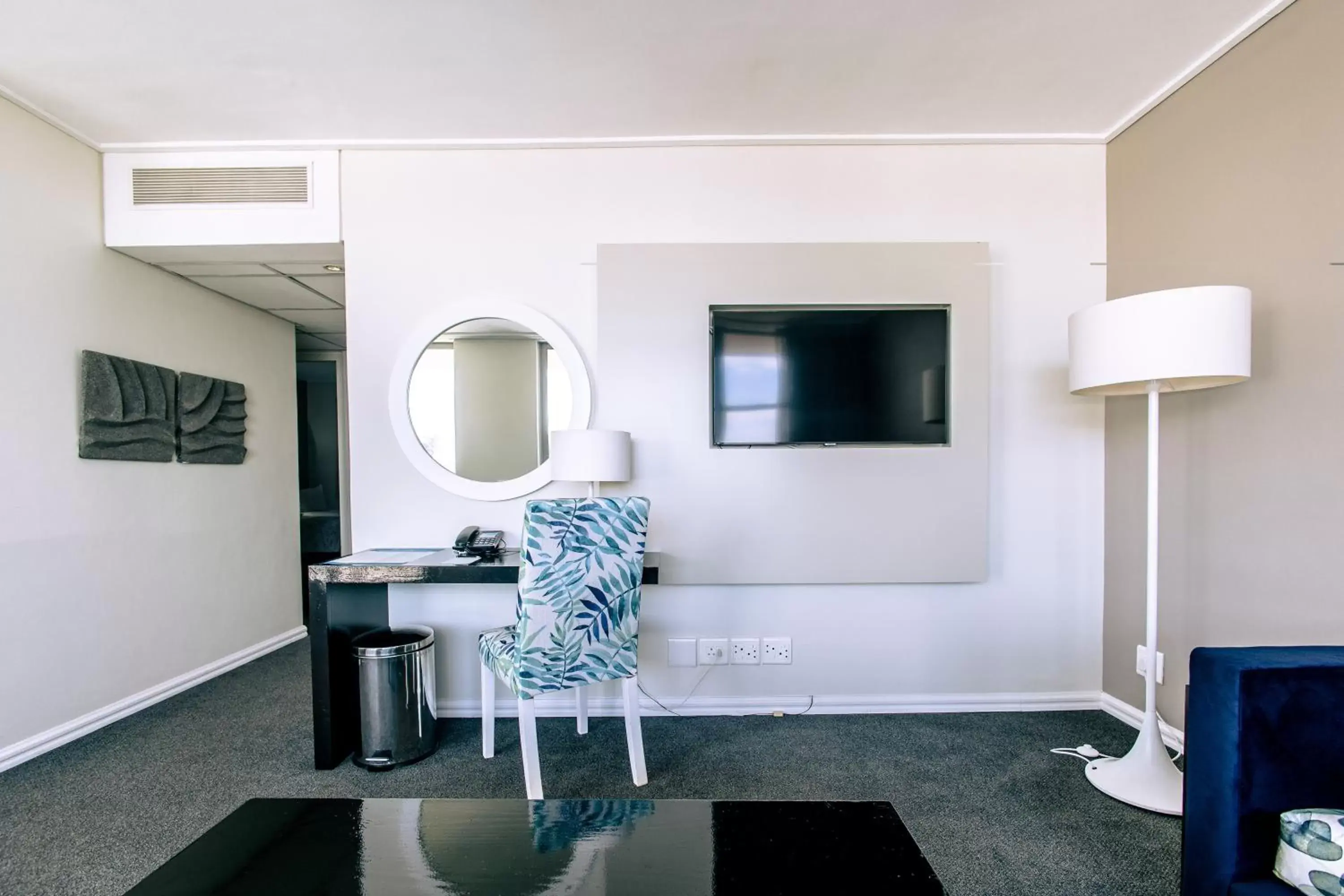 Living room, TV/Entertainment Center in Lagoon Beach Hotel & Spa