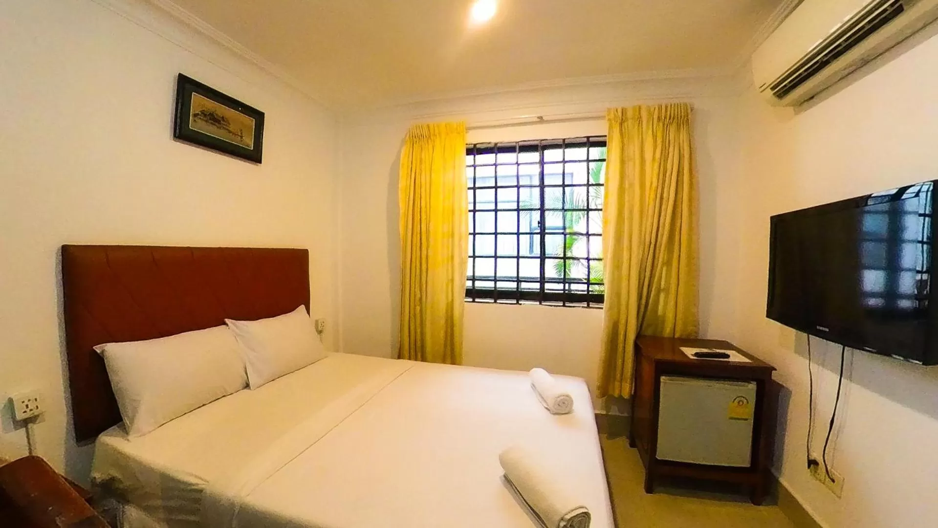 Bed in Riverside Hotel Phnom Penh