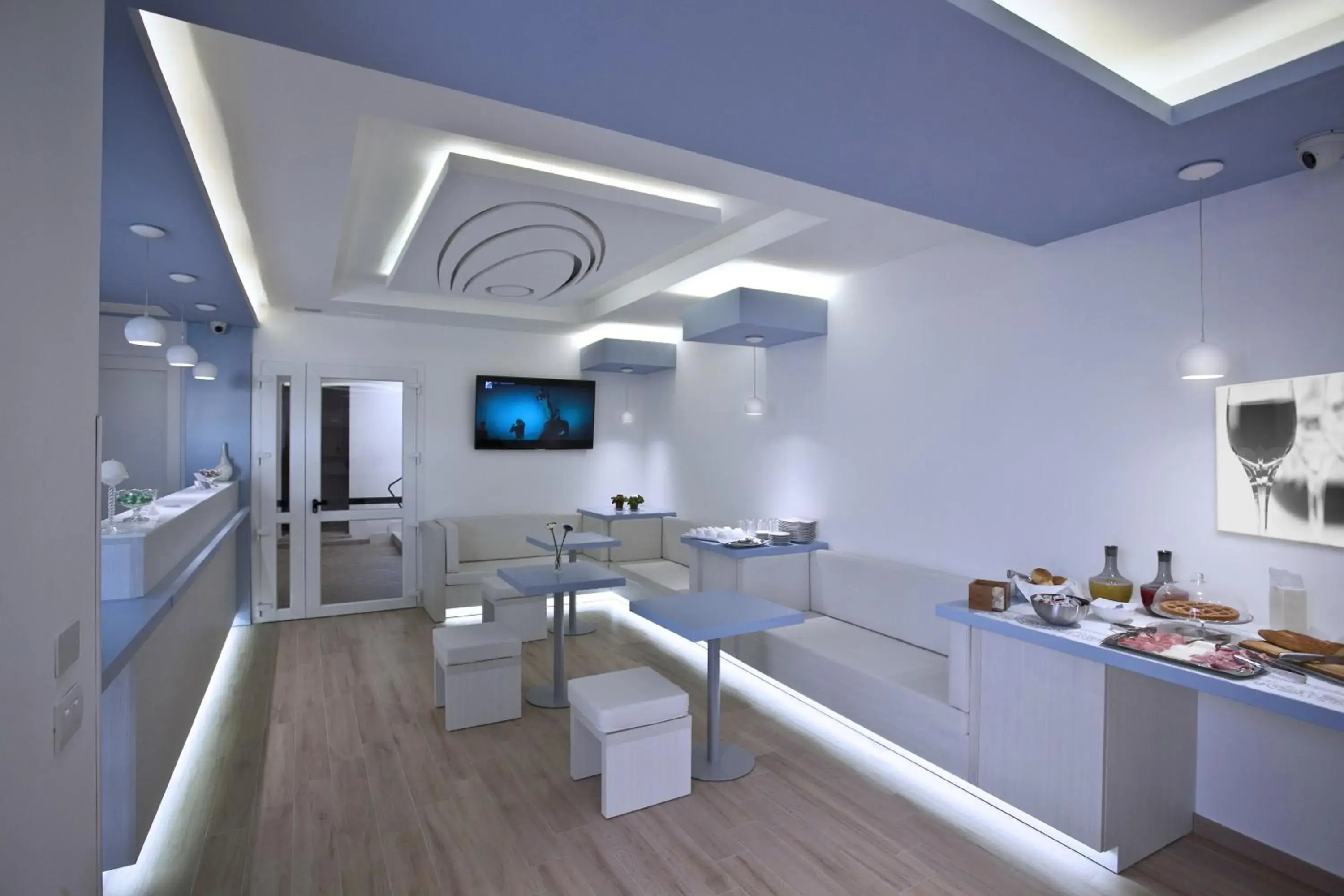 Lobby or reception, Kitchen/Kitchenette in Hotel Perla Gaia