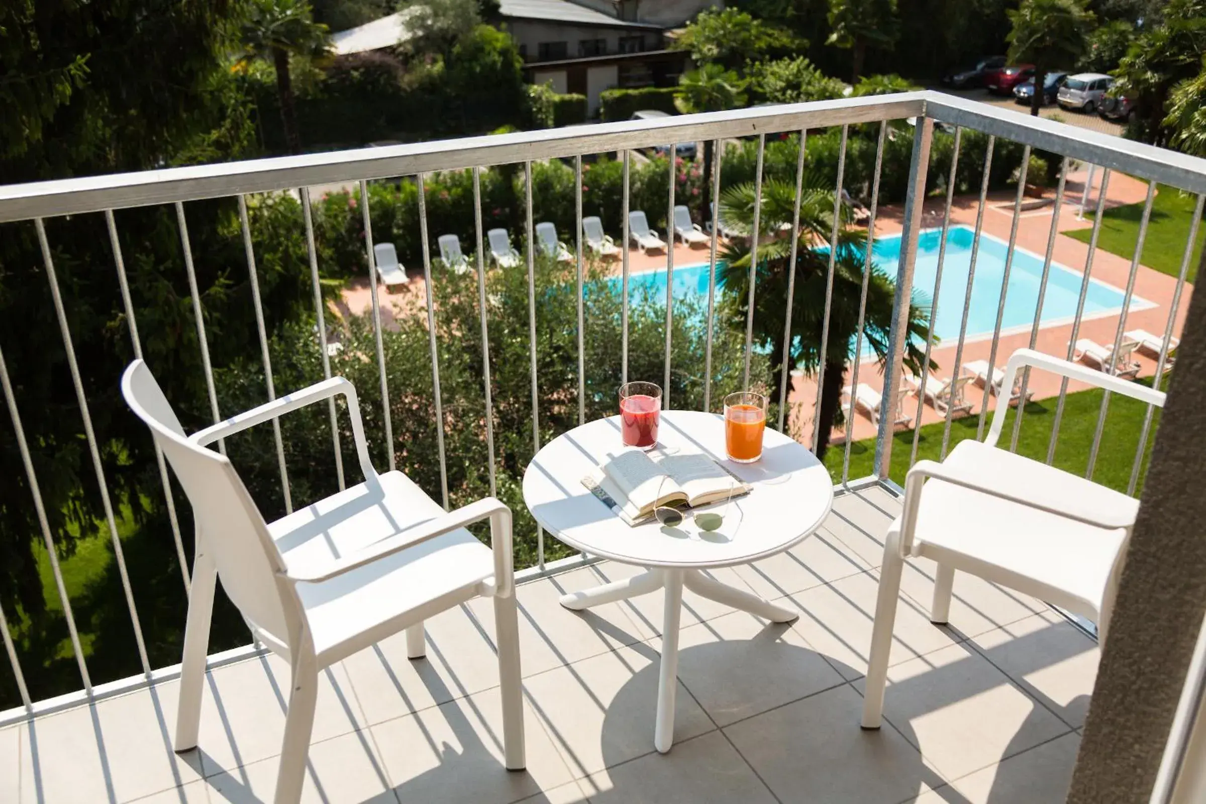 Balcony/Terrace, Pool View in Brione Green Resort