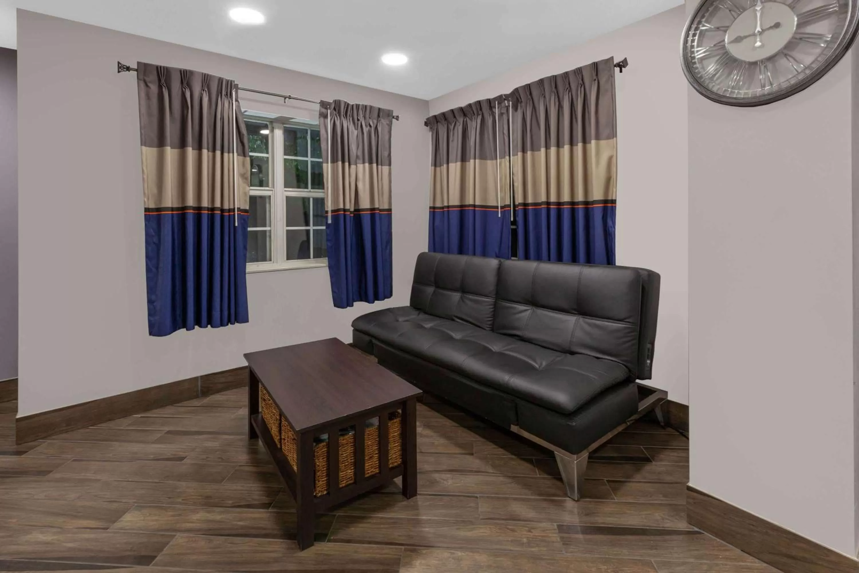 Seating area in Microtel Inn Suite by Wyndham BWI Airport