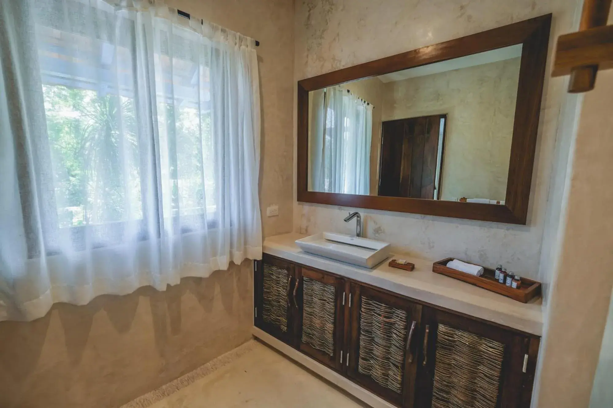 Bathroom in Wakax Hacienda - Cenote & Boutique Hotel