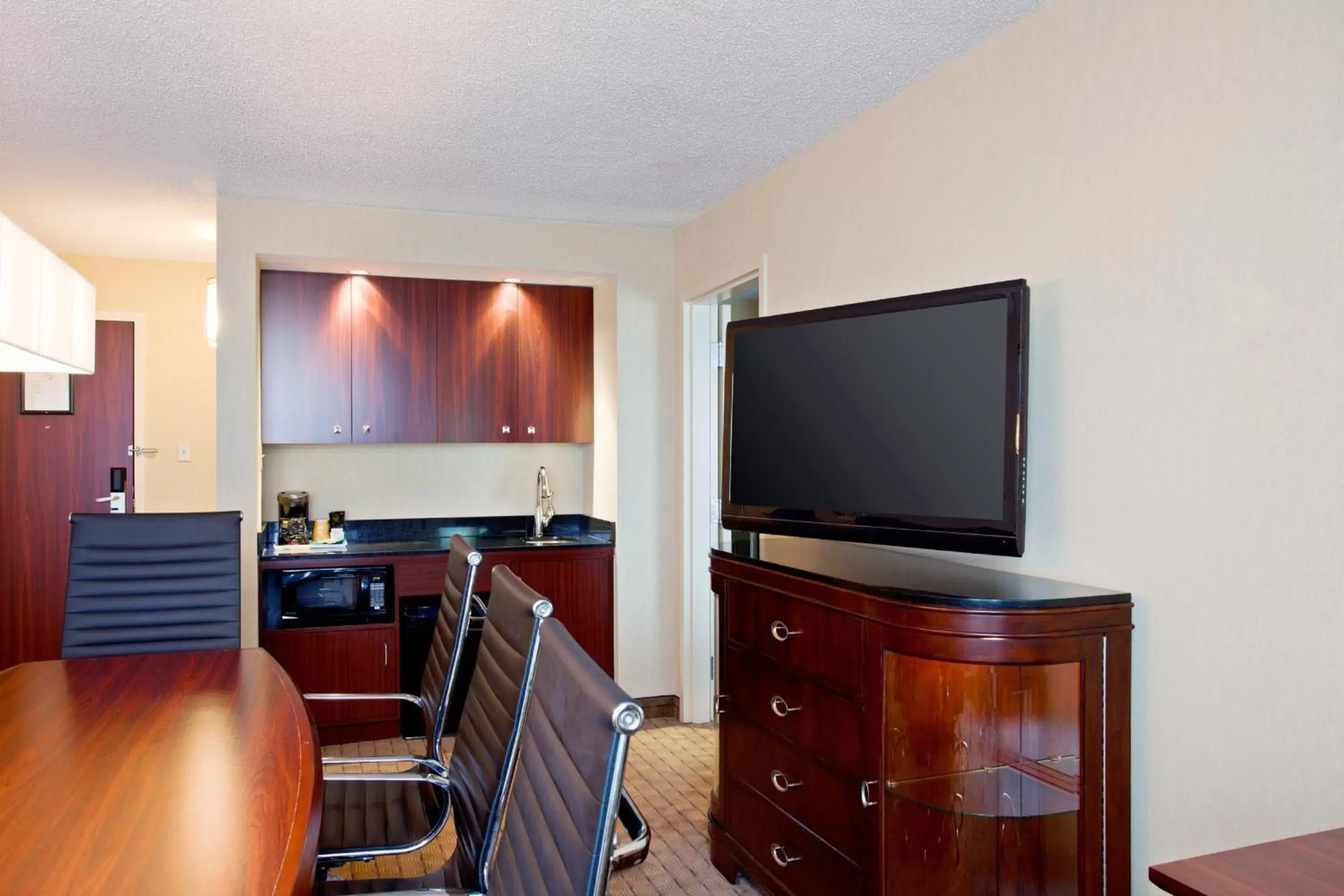 Photo of the whole room, TV/Entertainment Center in Holiday Inn & Suites Winnipeg Downtown, an IHG Hotel