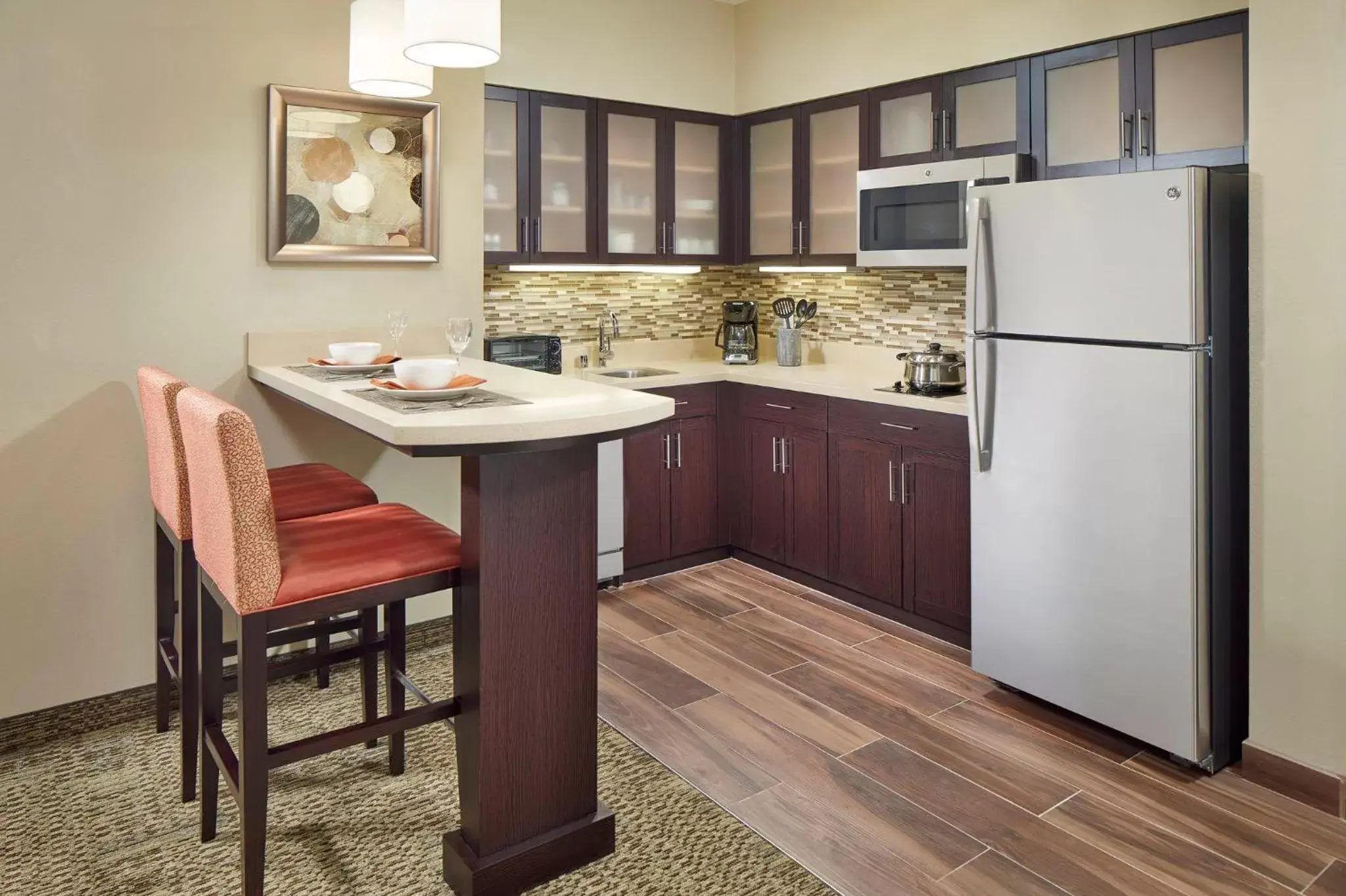 Photo of the whole room, Kitchen/Kitchenette in Staybridge Suites Anaheim At The Park, an IHG Hotel