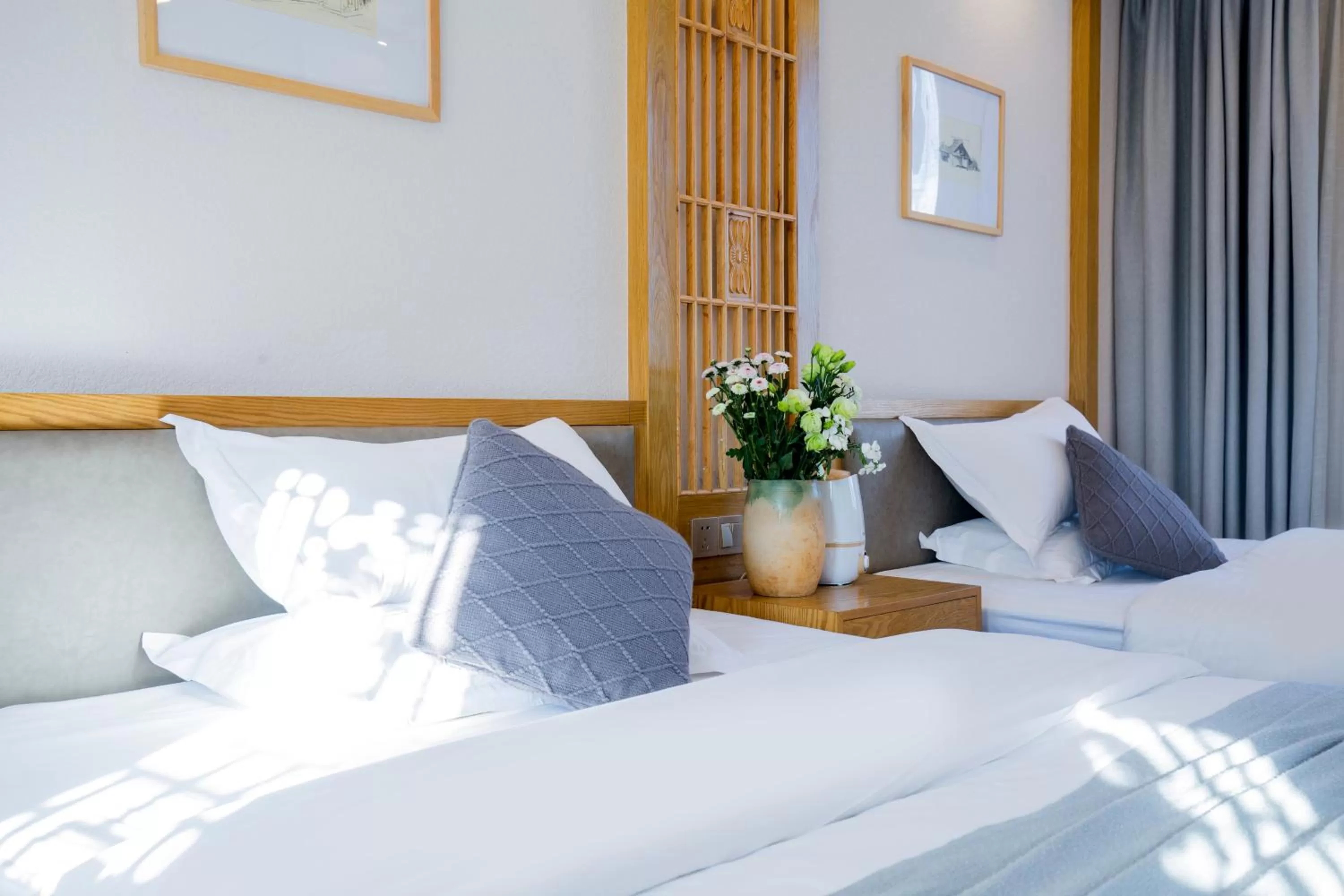 Bed in Lijiang Gemmer Hotel