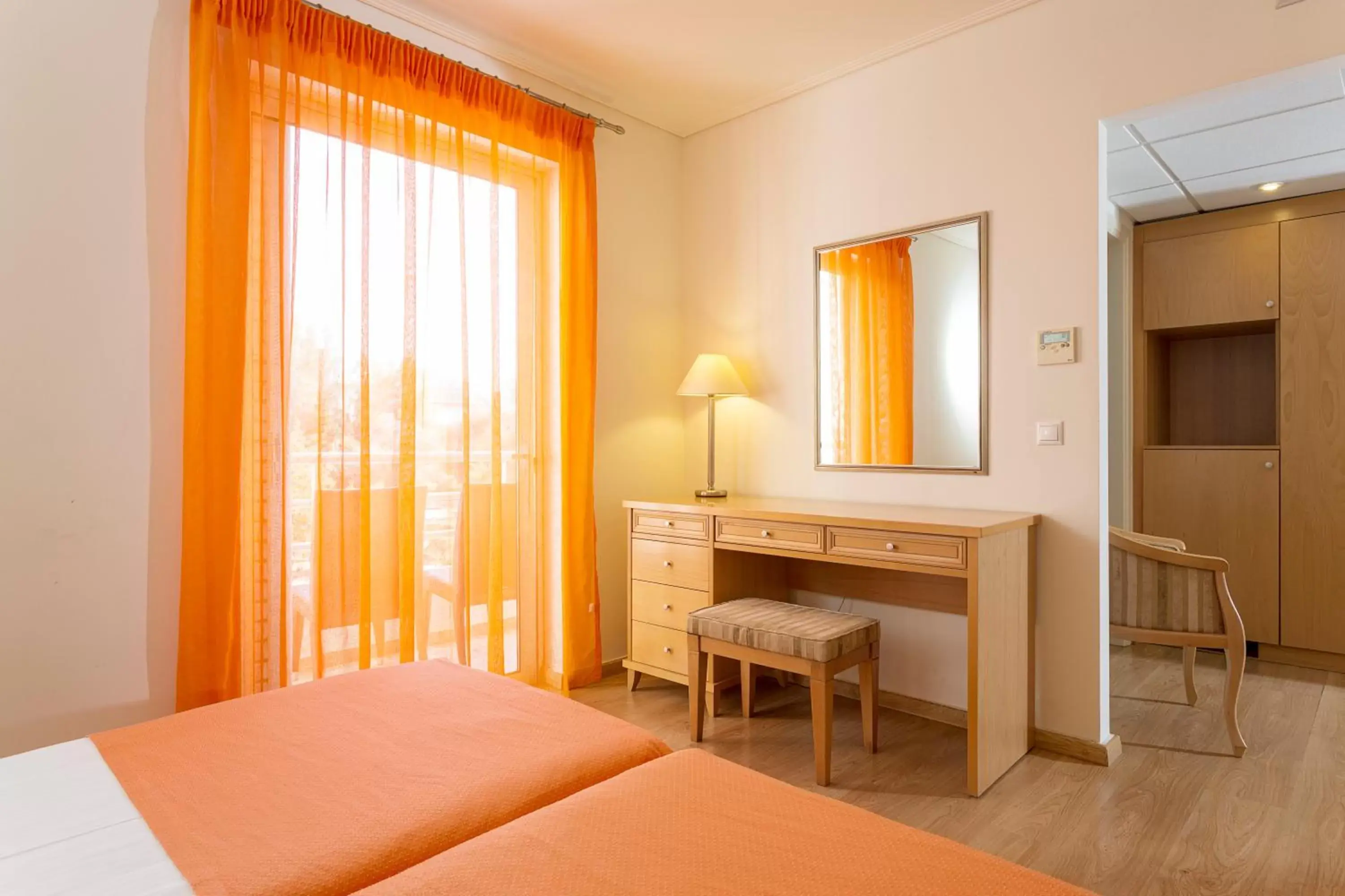 Bed in Civitel Attik Rooms & Suites