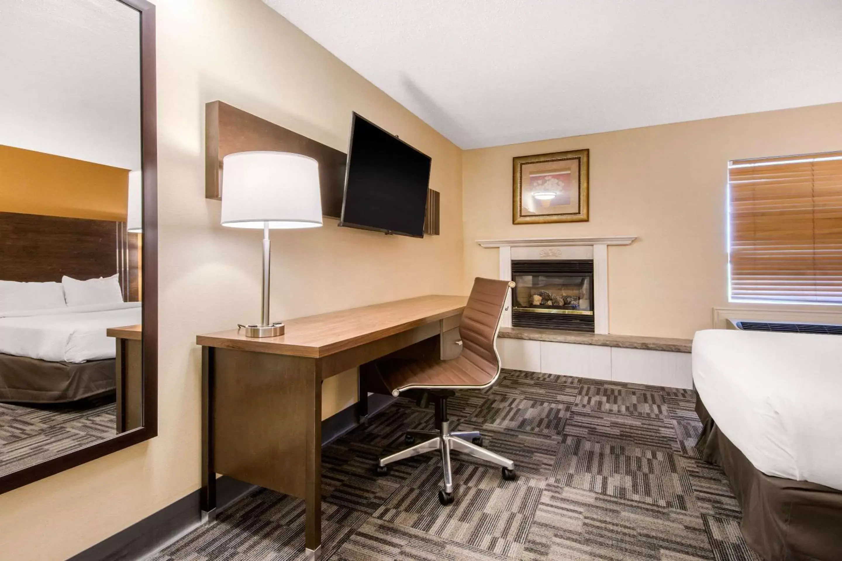 Photo of the whole room, TV/Entertainment Center in Quality Inn & Conference Centre